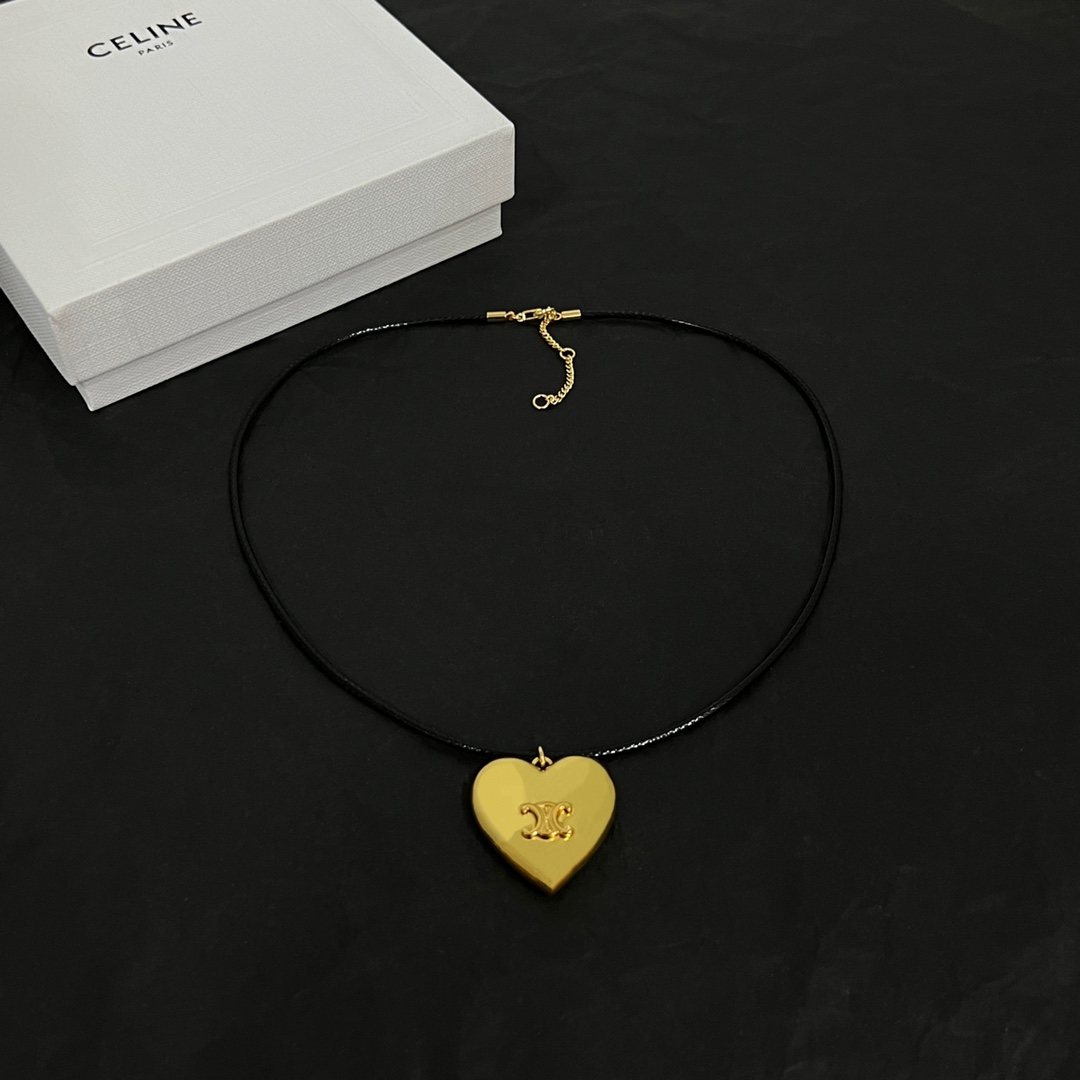 Celine CŒUR Triomphe Necklace In Brass With Gold Finish And Cotton - FashionPlug
