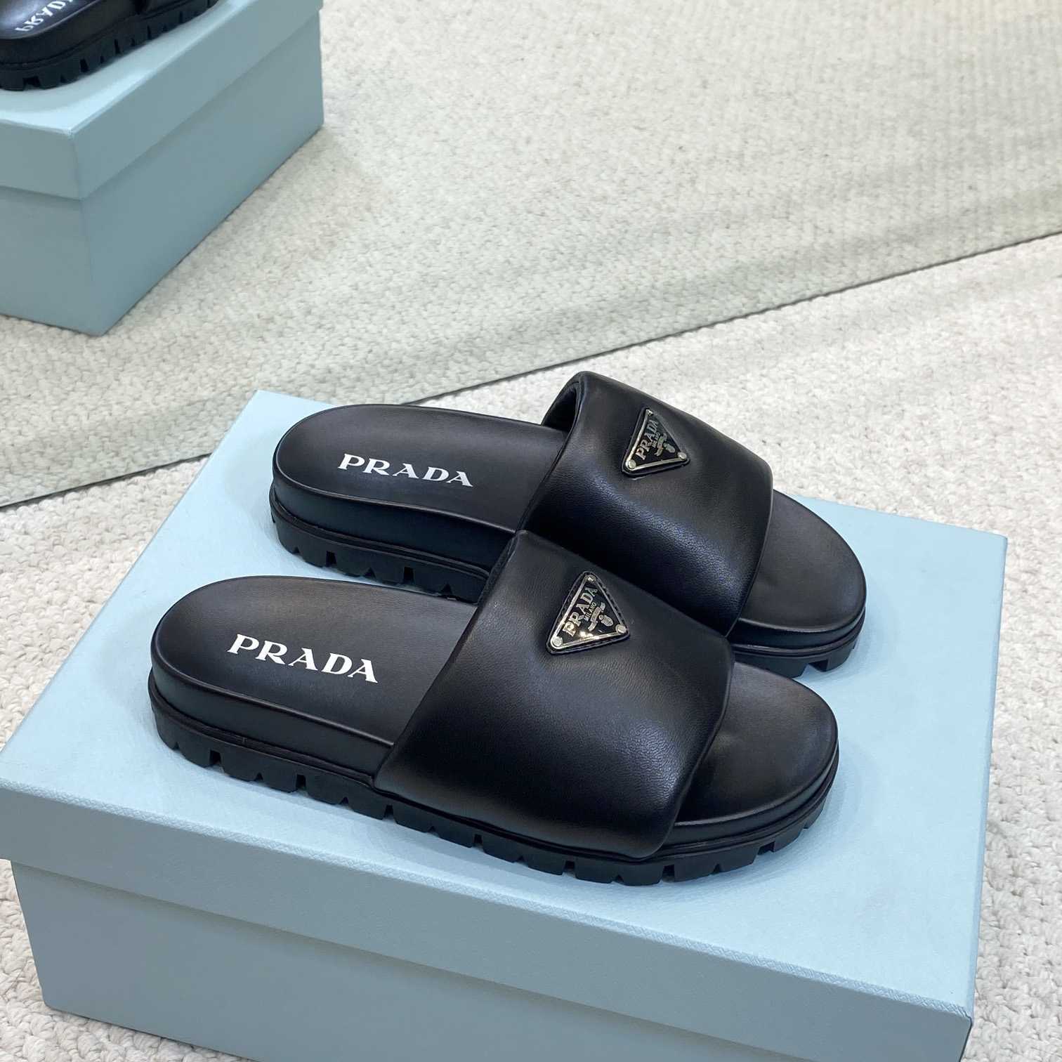 Prada Padded Nappa Leather Slides - FashionPlug