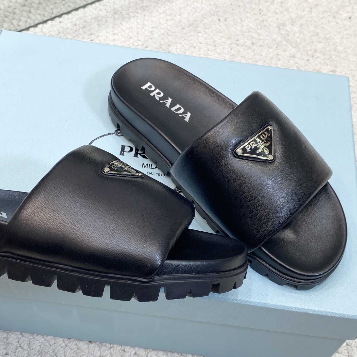 Prada Padded Nappa Leather Slides - FashionPlug