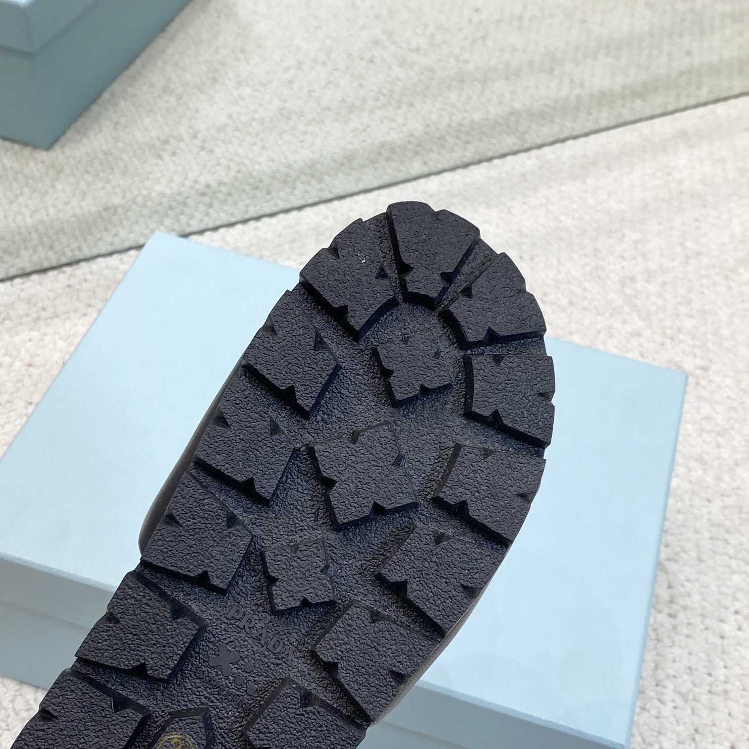 Prada Padded Nappa Leather Slides - FashionPlug