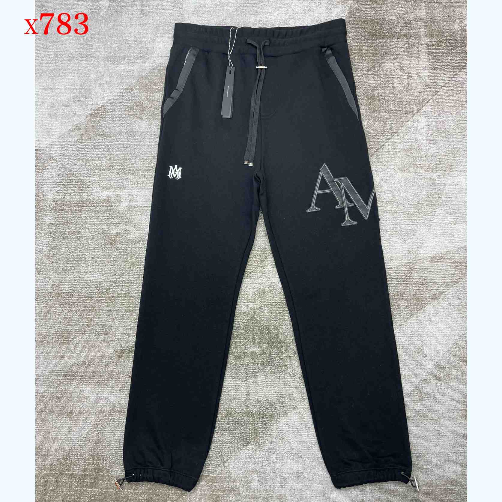 Amiri Staggered Sweatpants   x783 - FashionPlug