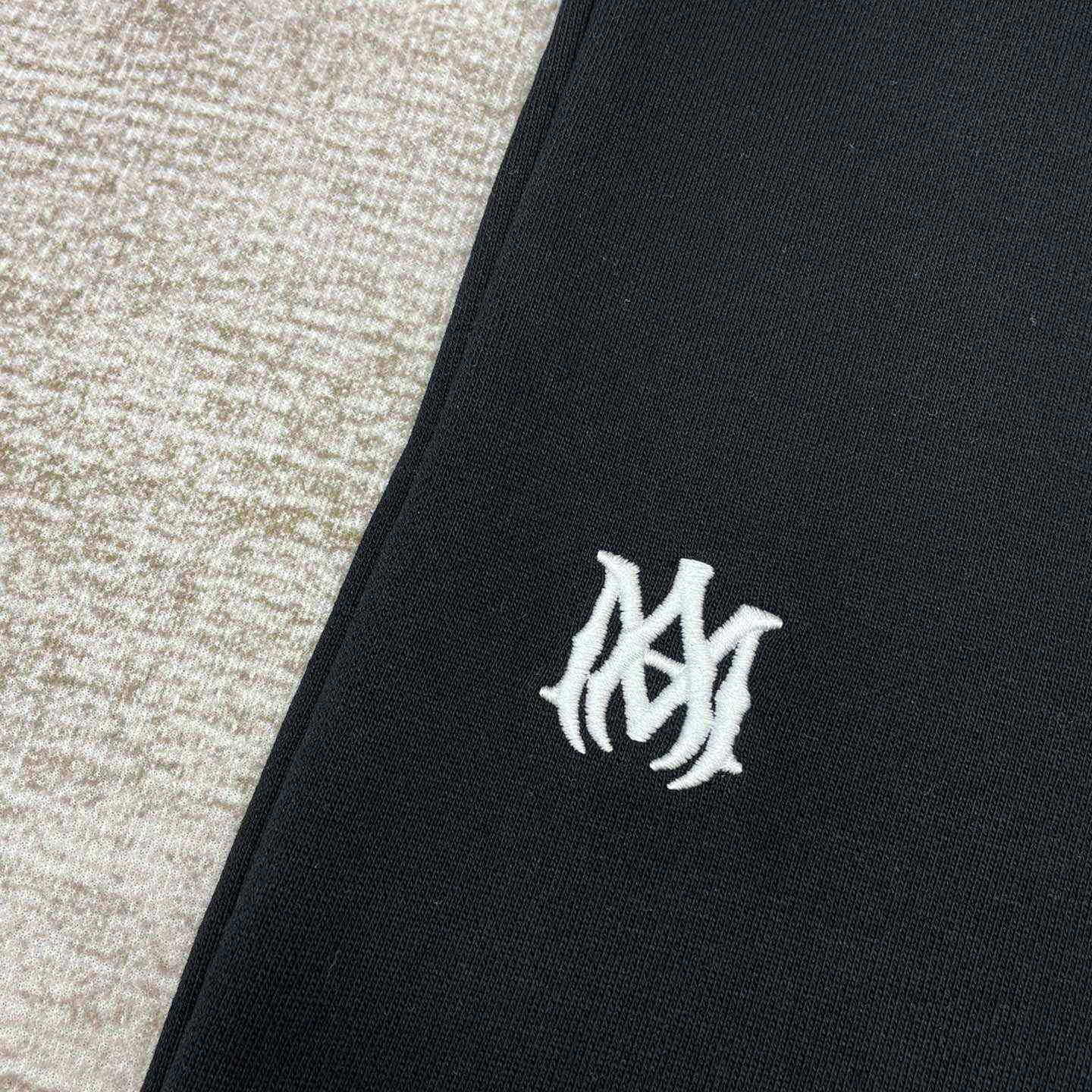 Amiri Staggered Sweatpants   x783 - FashionPlug