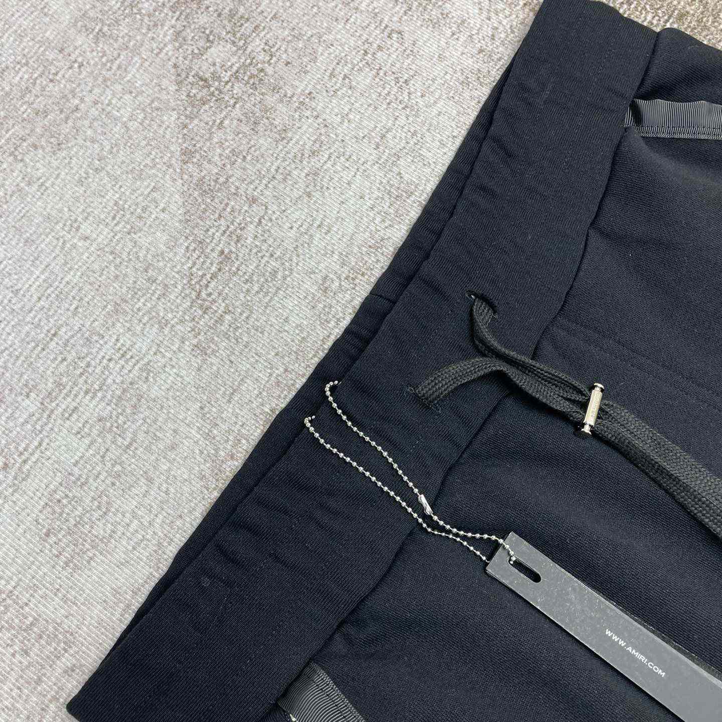 Amiri Staggered Sweatpants   x783 - FashionPlug
