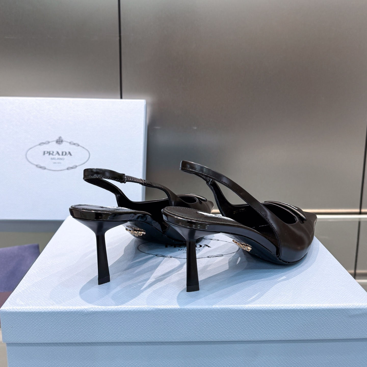 Prada Brushed Leather Slingback Pumps - FashionPlug