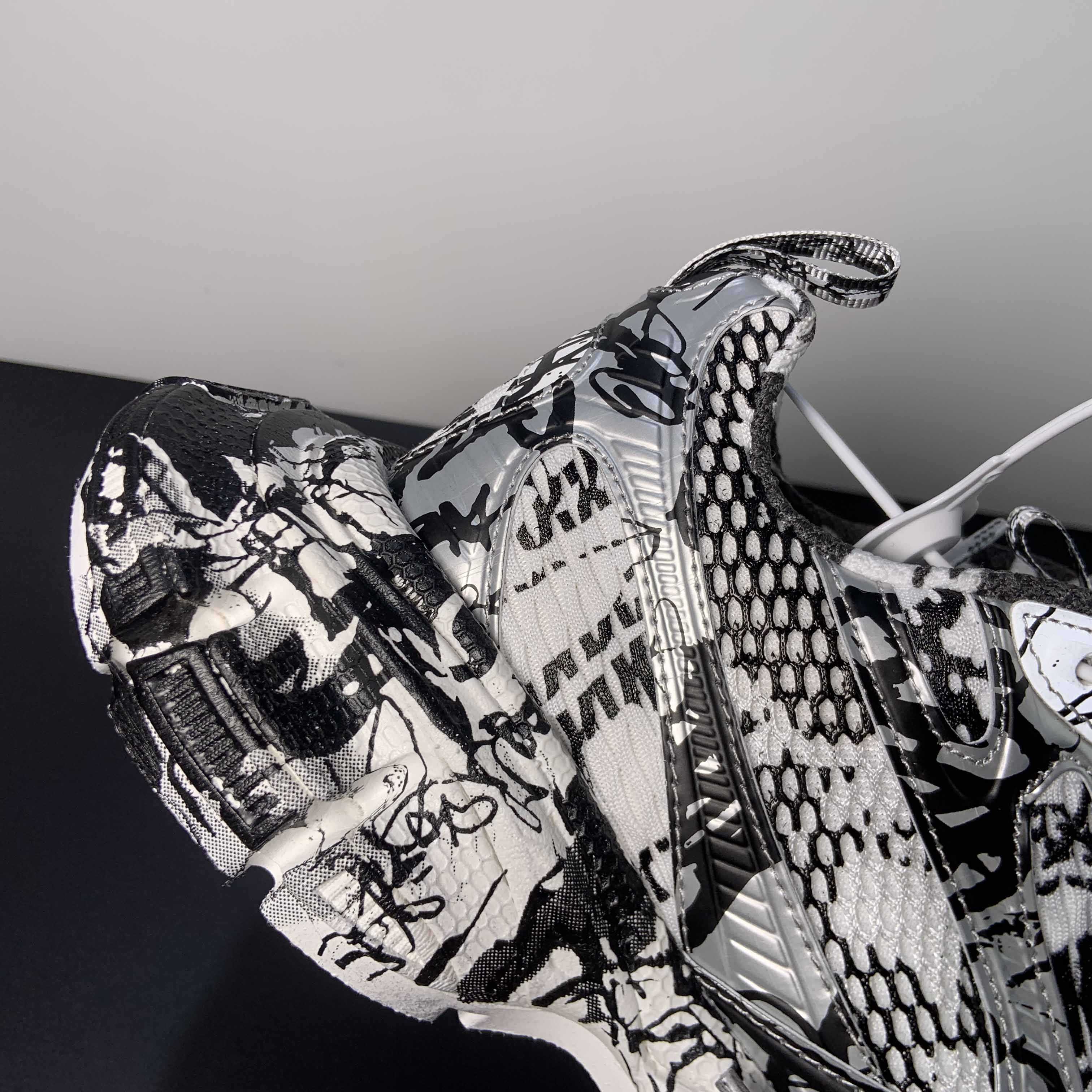 Balenciaga 3XL Extreme Graffiti Sneaker In White And Black  - FashionPlug