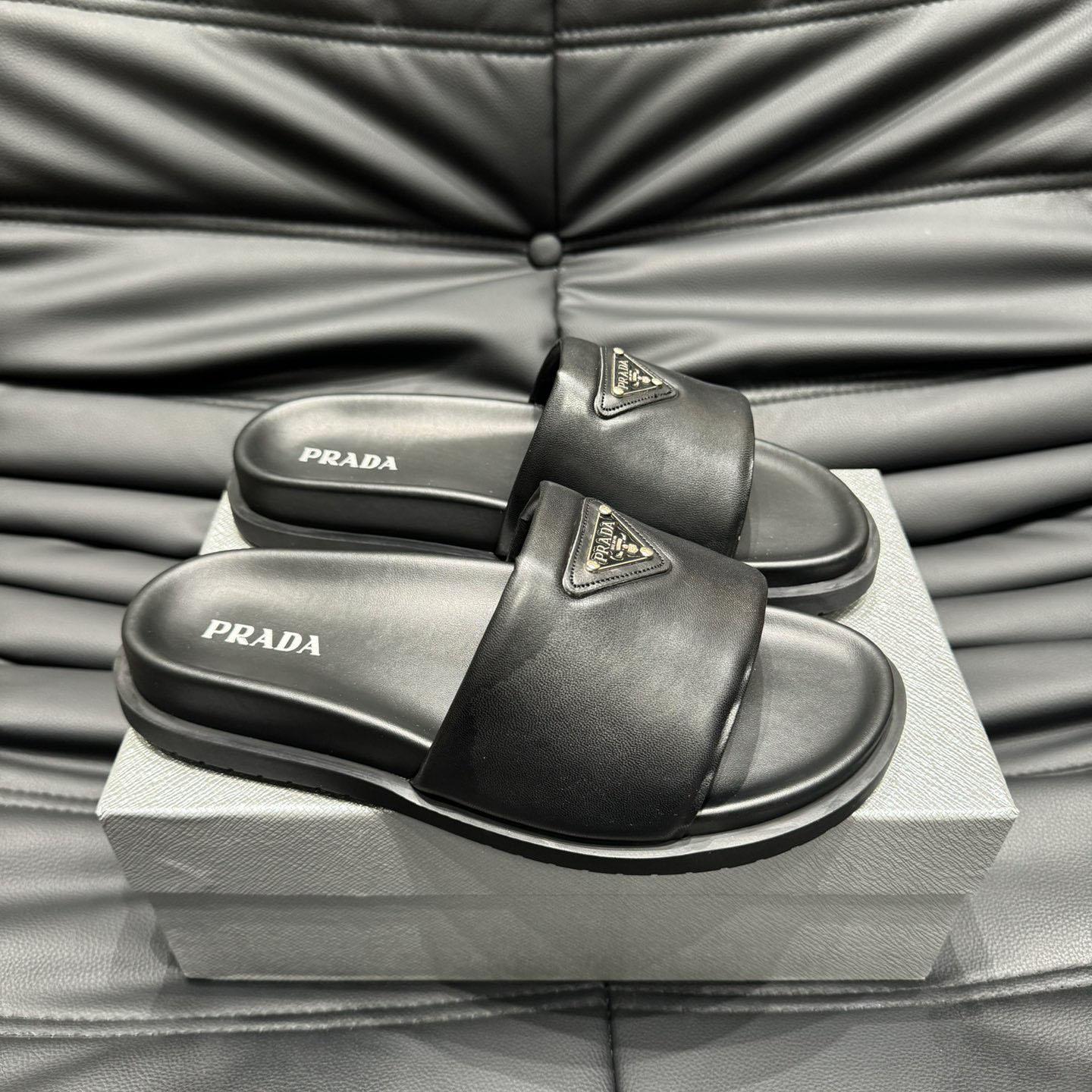 Prada Padded Nappa Leather Slides - FashionPlug