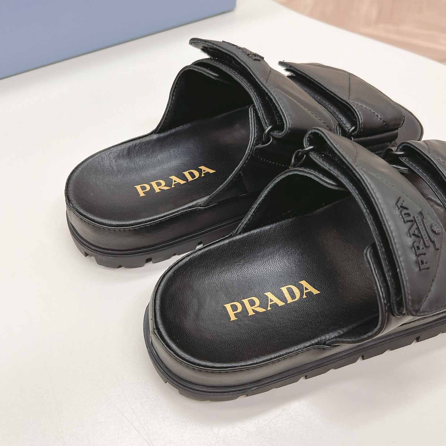 Prada Padded Nappa Leather Sandals - FashionPlug