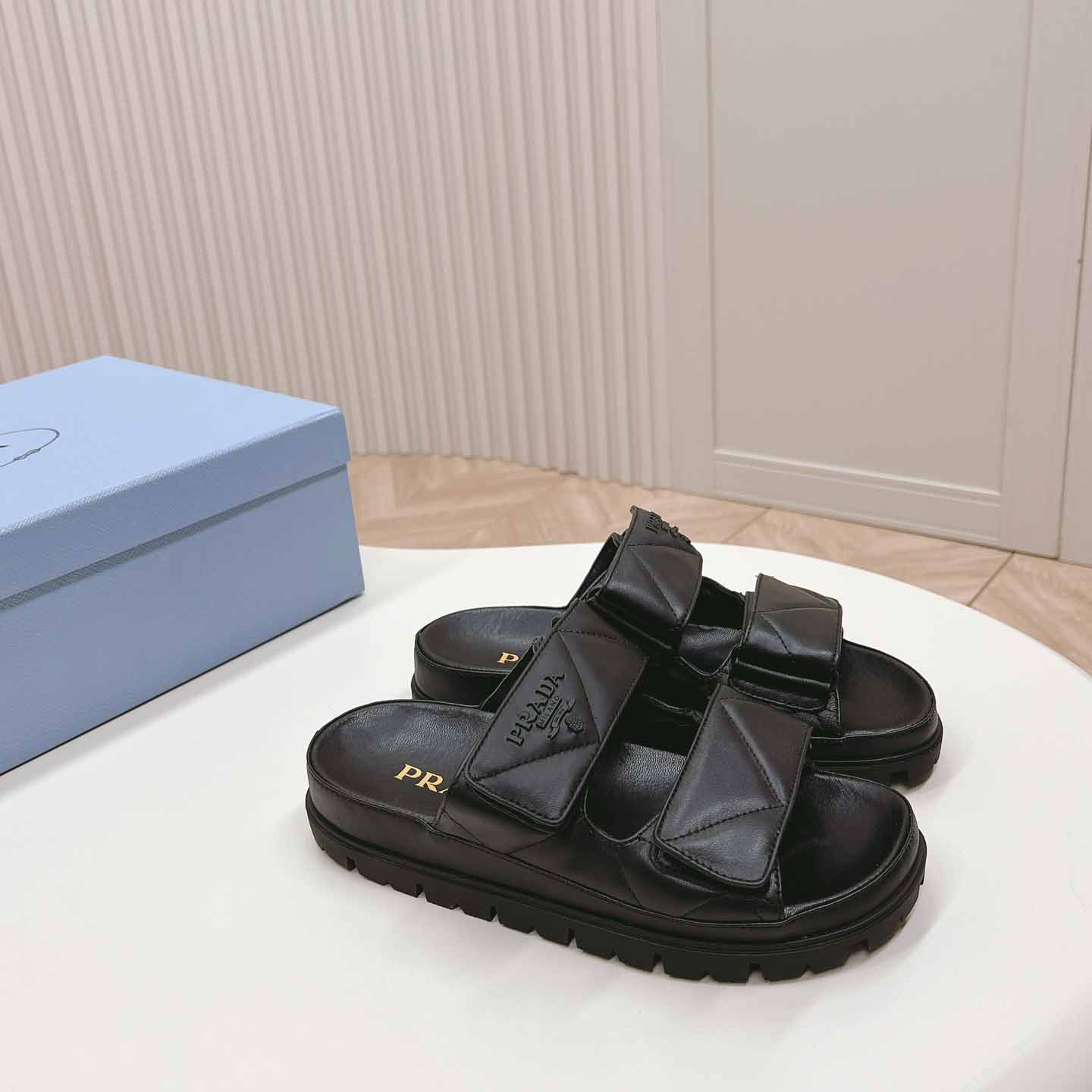 Prada Padded Nappa Leather Sandals - FashionPlug