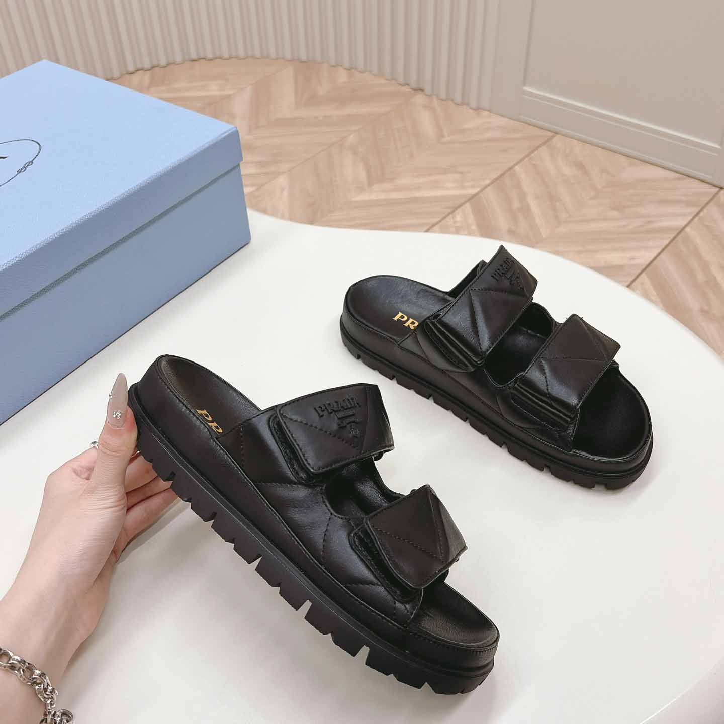 Prada Padded Nappa Leather Sandals - FashionPlug