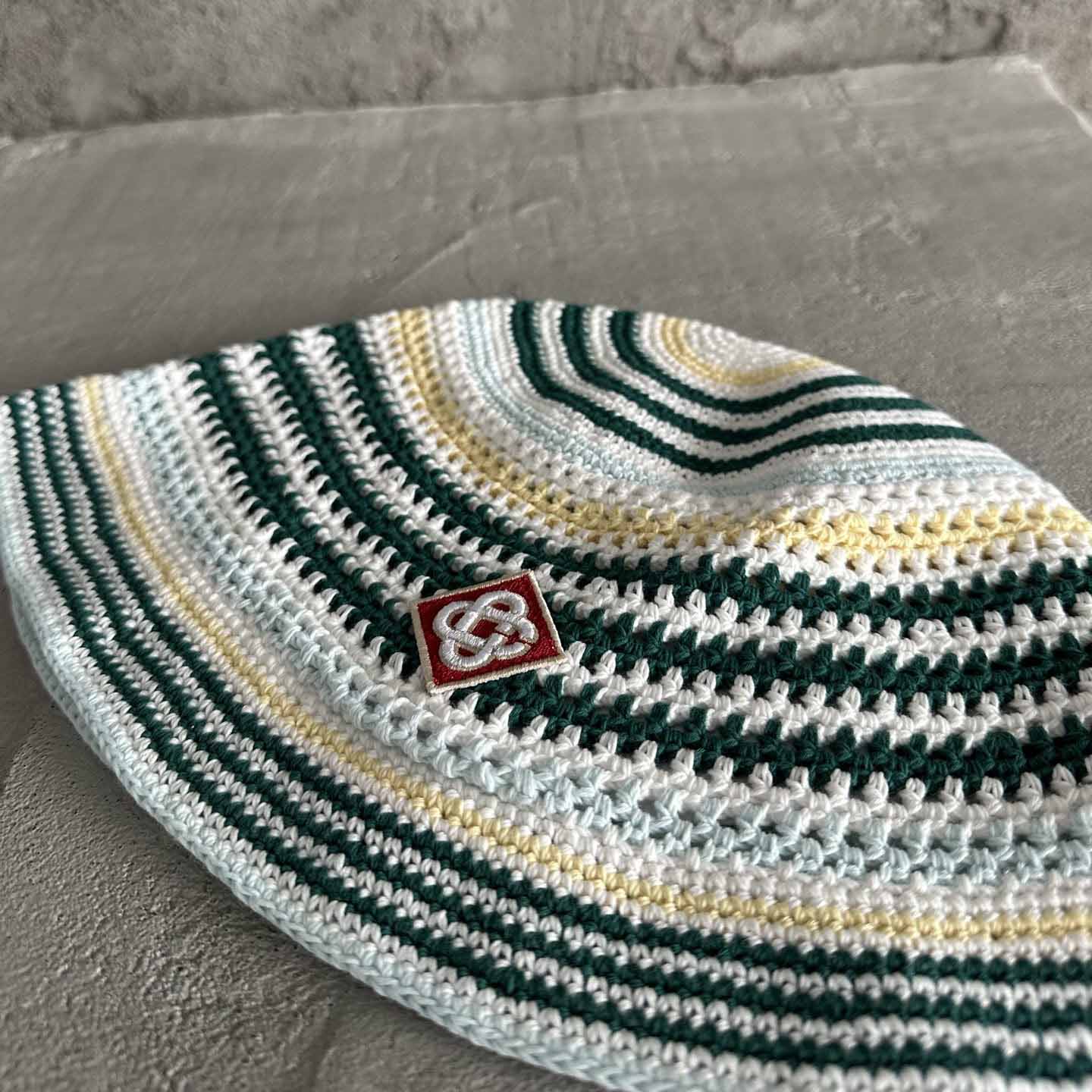 Casablanca Monogram-patch Crochet Bucket Hat - FashionPlug