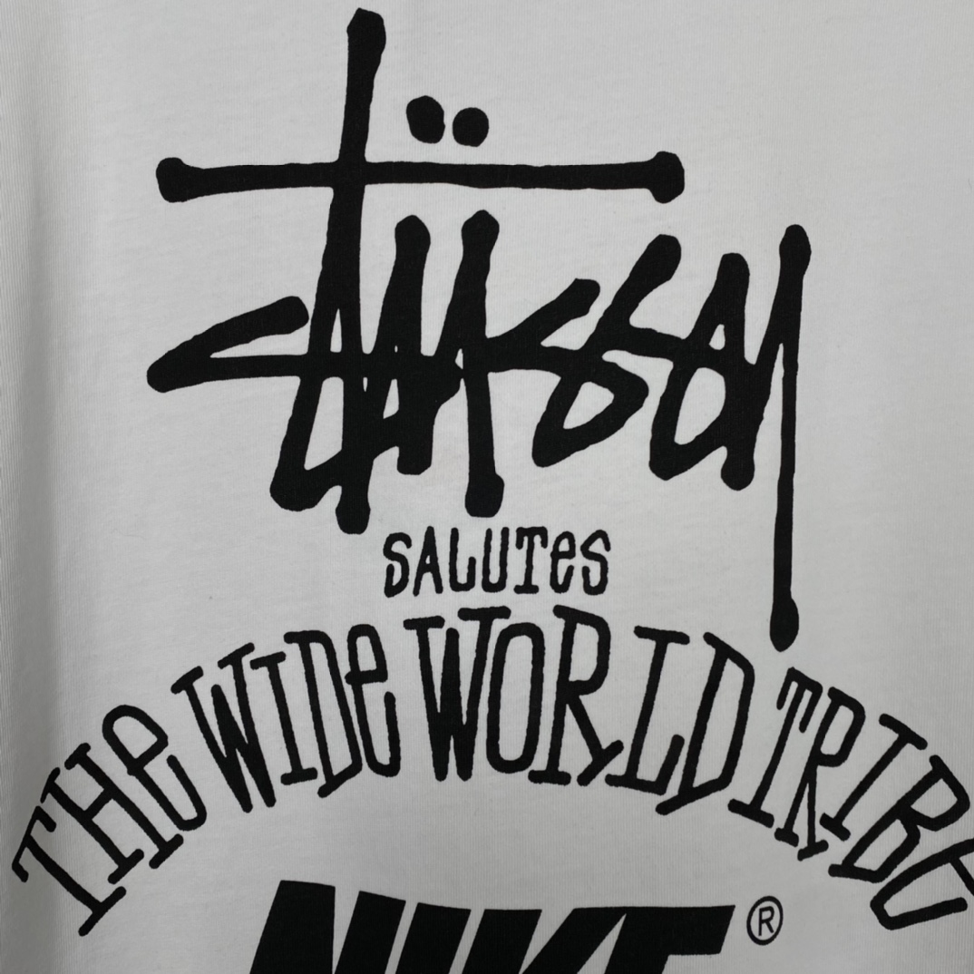 Nike x Stussy The Wide World Tribe T-Shirt - FashionPlug