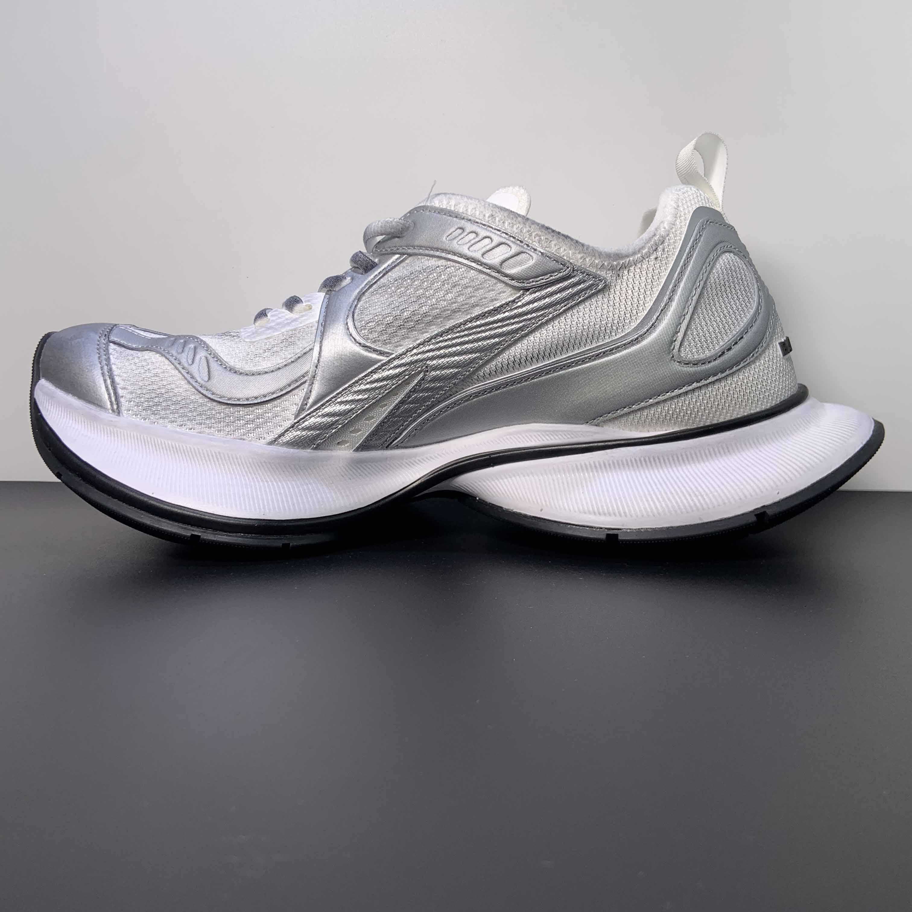 Balenciaga Circuit Sneaker In White And Silver  - FashionPlug