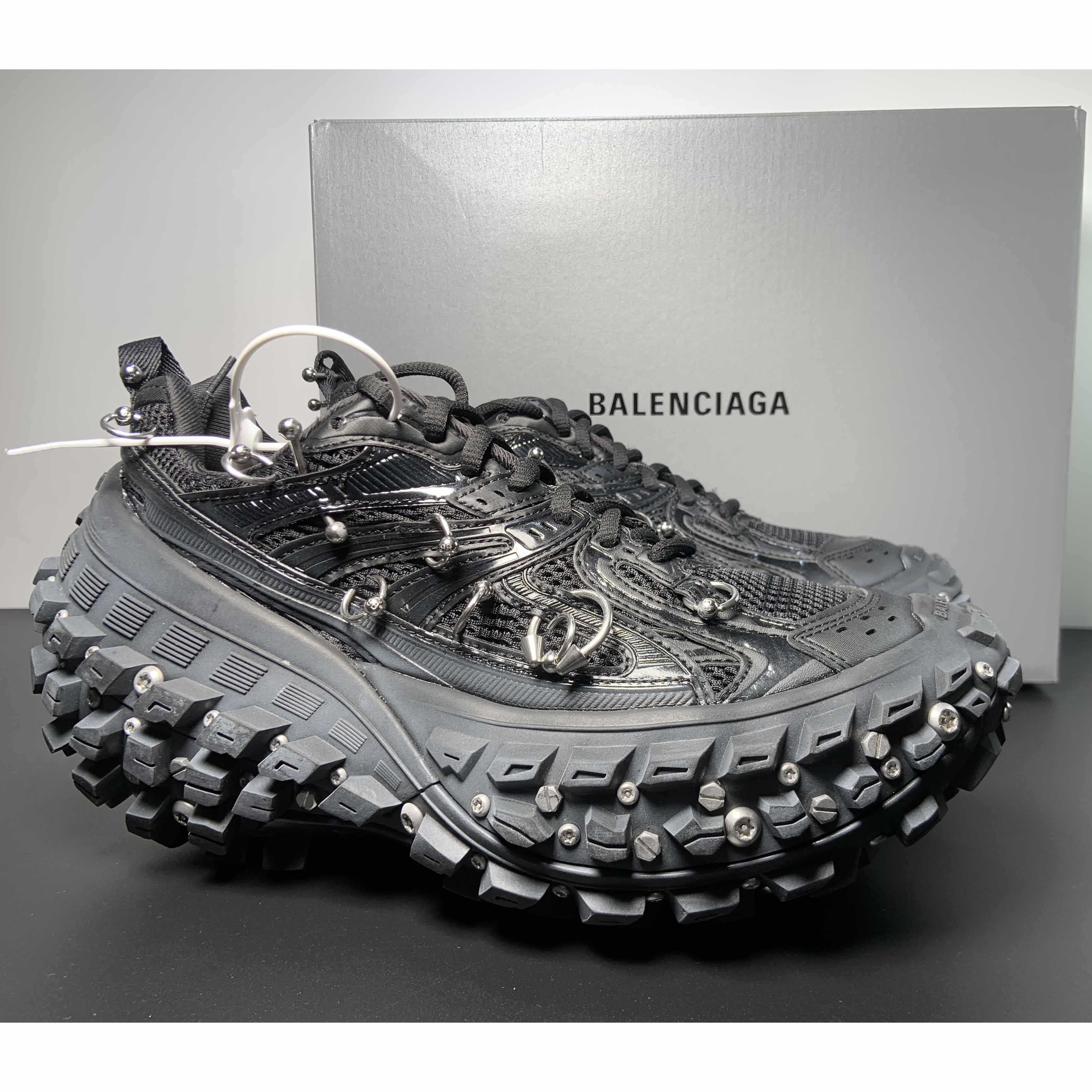 Balenciaga Bouncer Screw Sneaker With Piercings In Black - FashionPlug