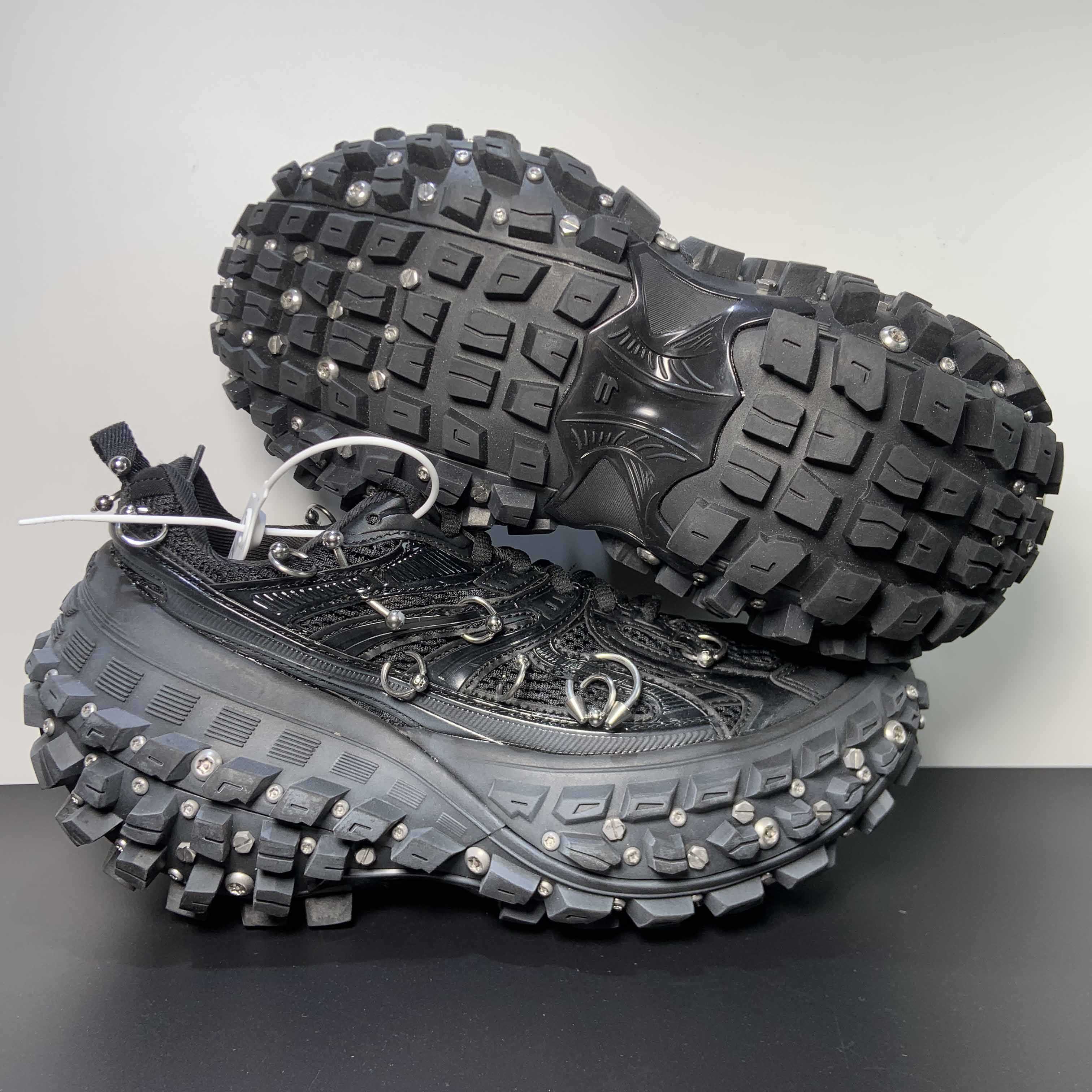 Balenciaga Bouncer Screw Sneaker With Piercings In Black - FashionPlug