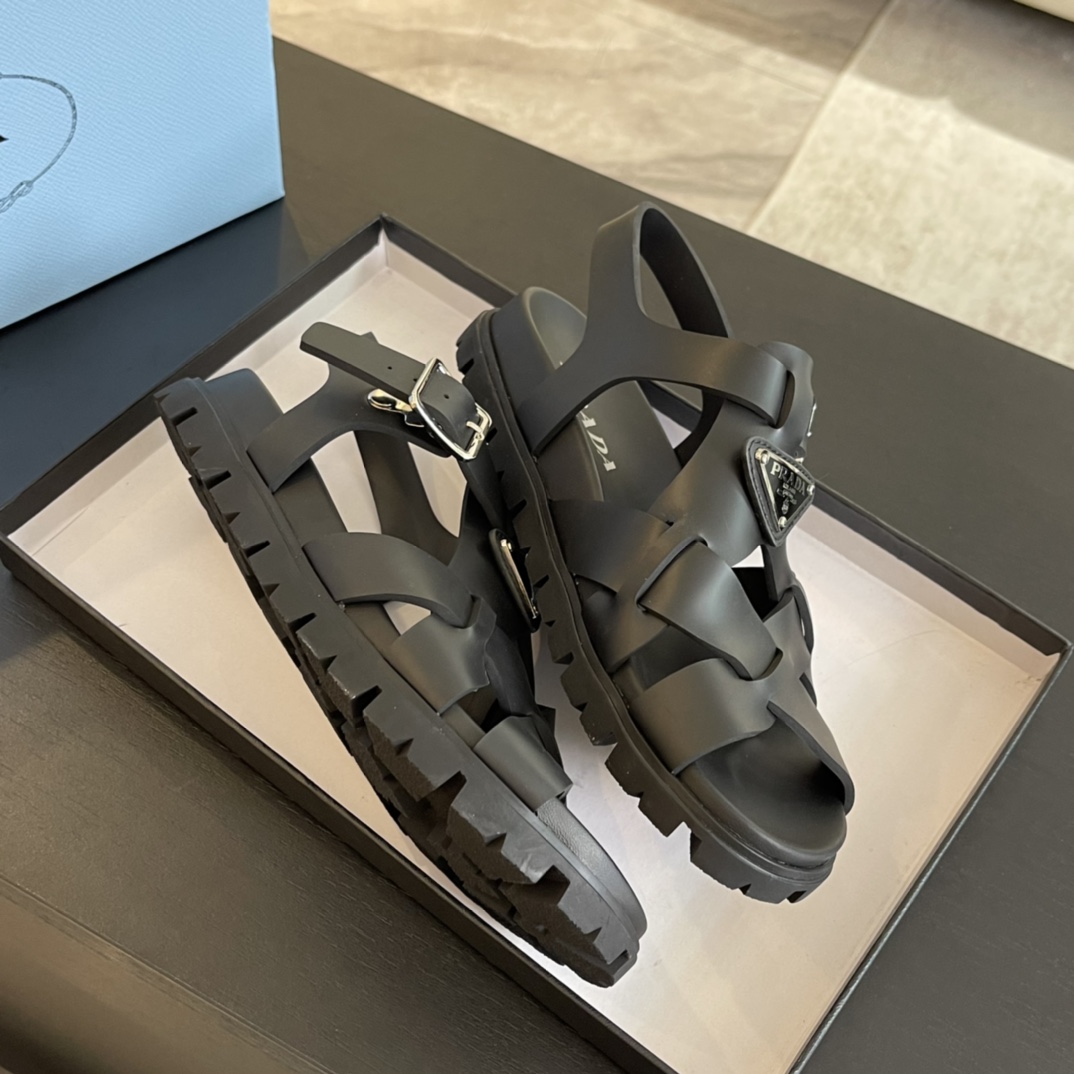 Prada Crisscross Rubber Sandals - FashionPlug