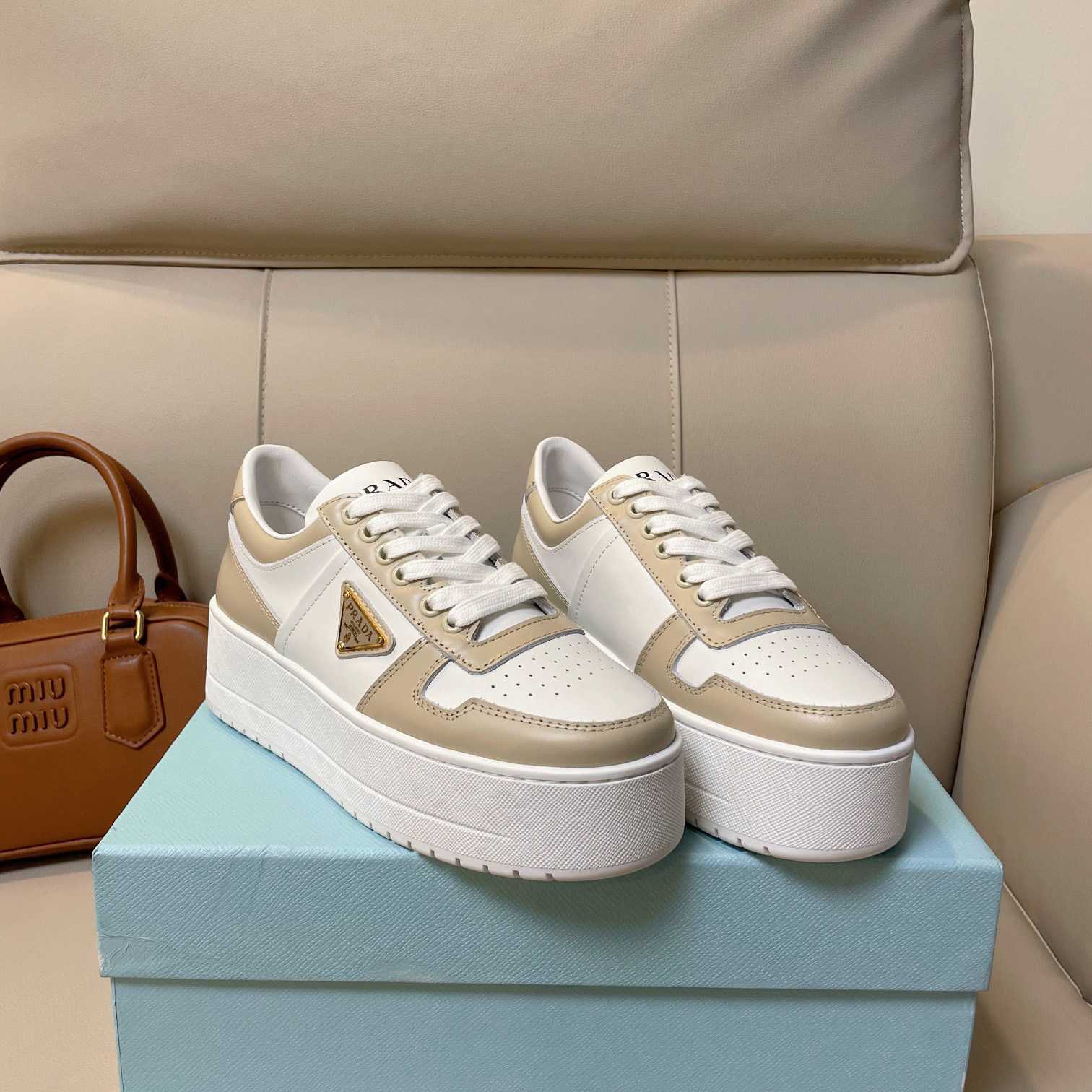 Prada Downtown Bold Leather Sneakers - FashionPlug