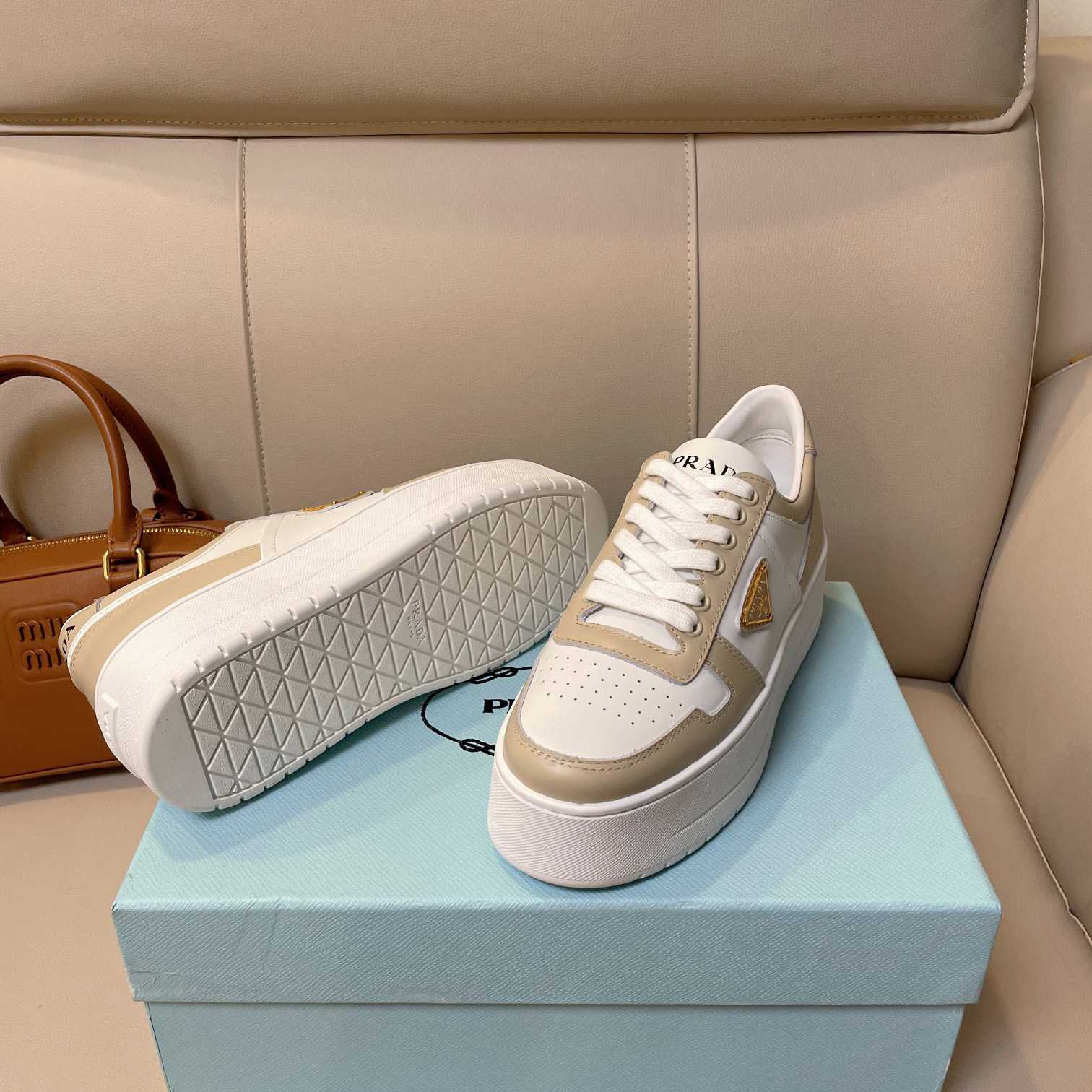 Prada Downtown Bold Leather Sneakers - FashionPlug
