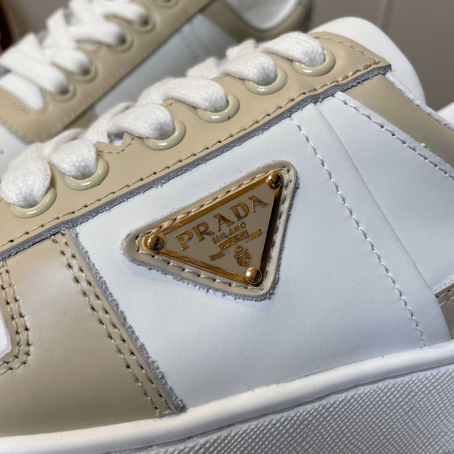 Prada Downtown Bold Leather Sneakers - FashionPlug