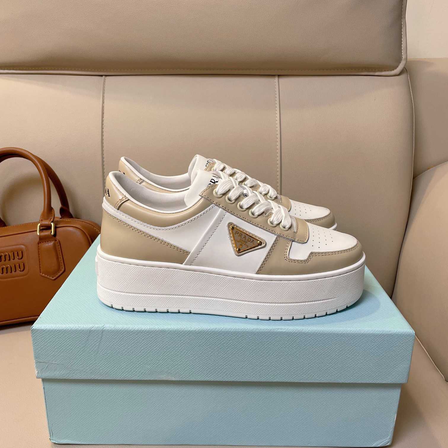 Prada Downtown Bold Leather Sneakers - FashionPlug