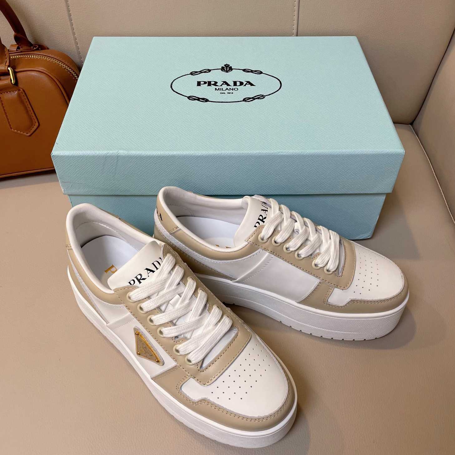 Prada Downtown Bold Leather Sneakers - FashionPlug