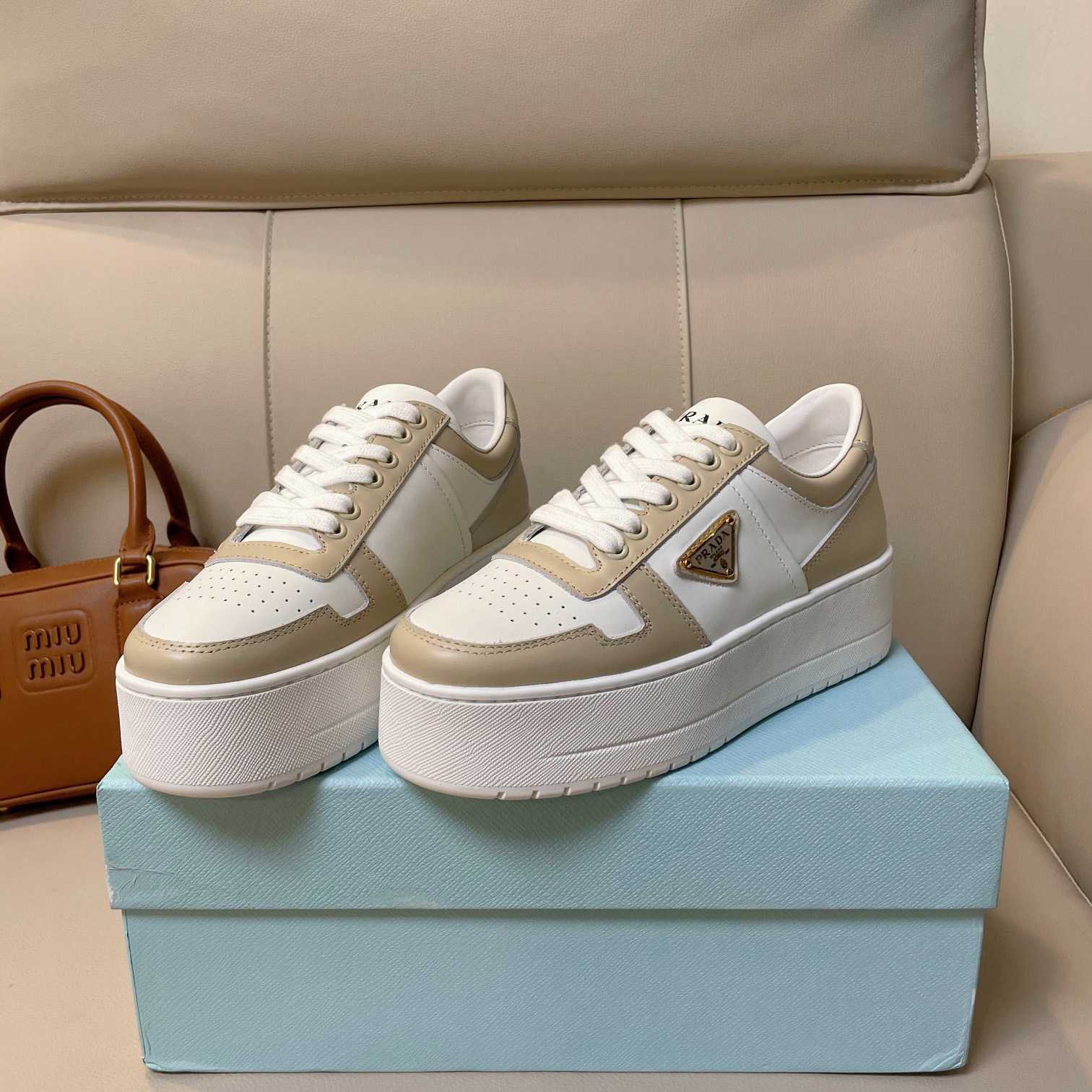 Prada Downtown Bold Leather Sneakers - FashionPlug