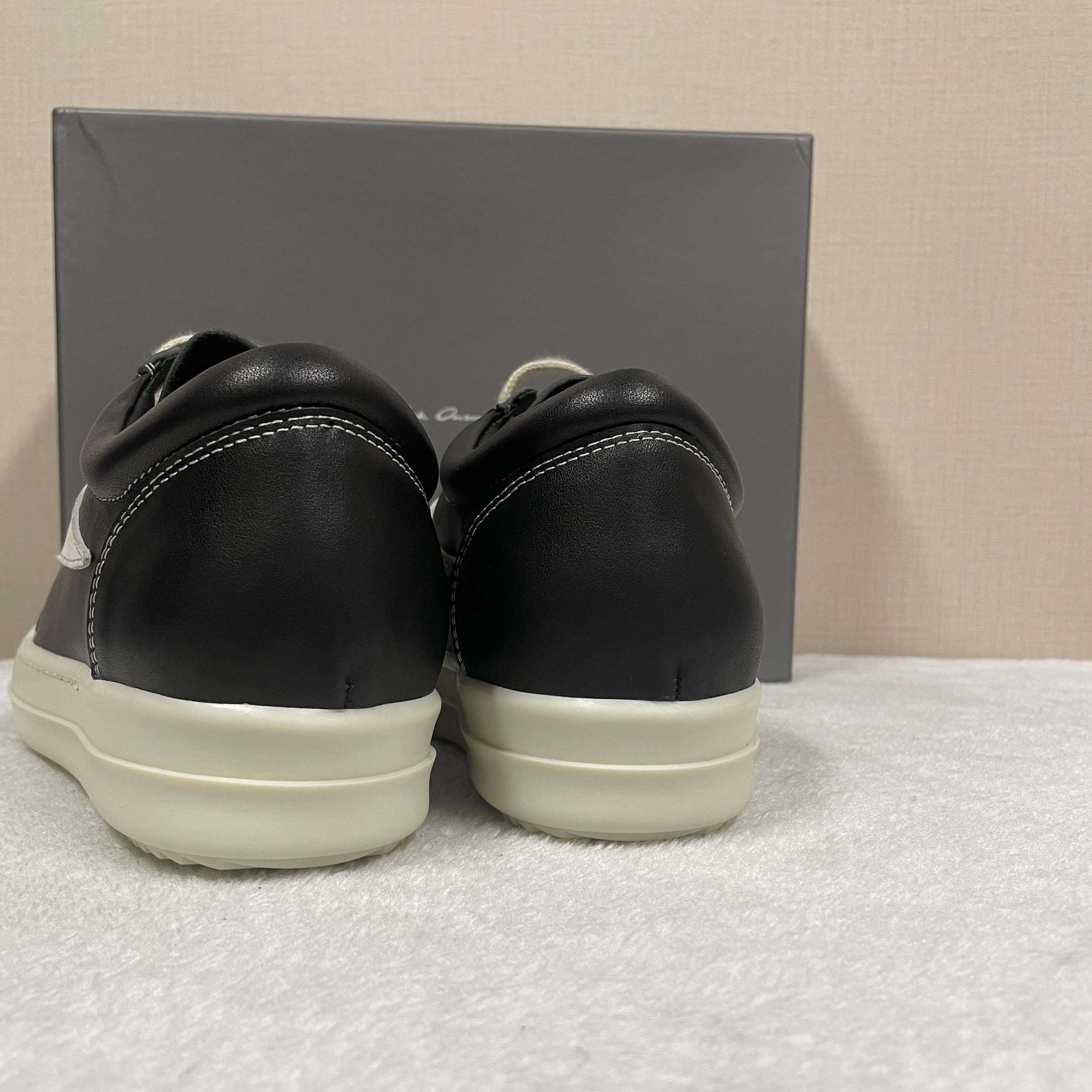Rick Owens Low-Top Sneakers - FashionPlug