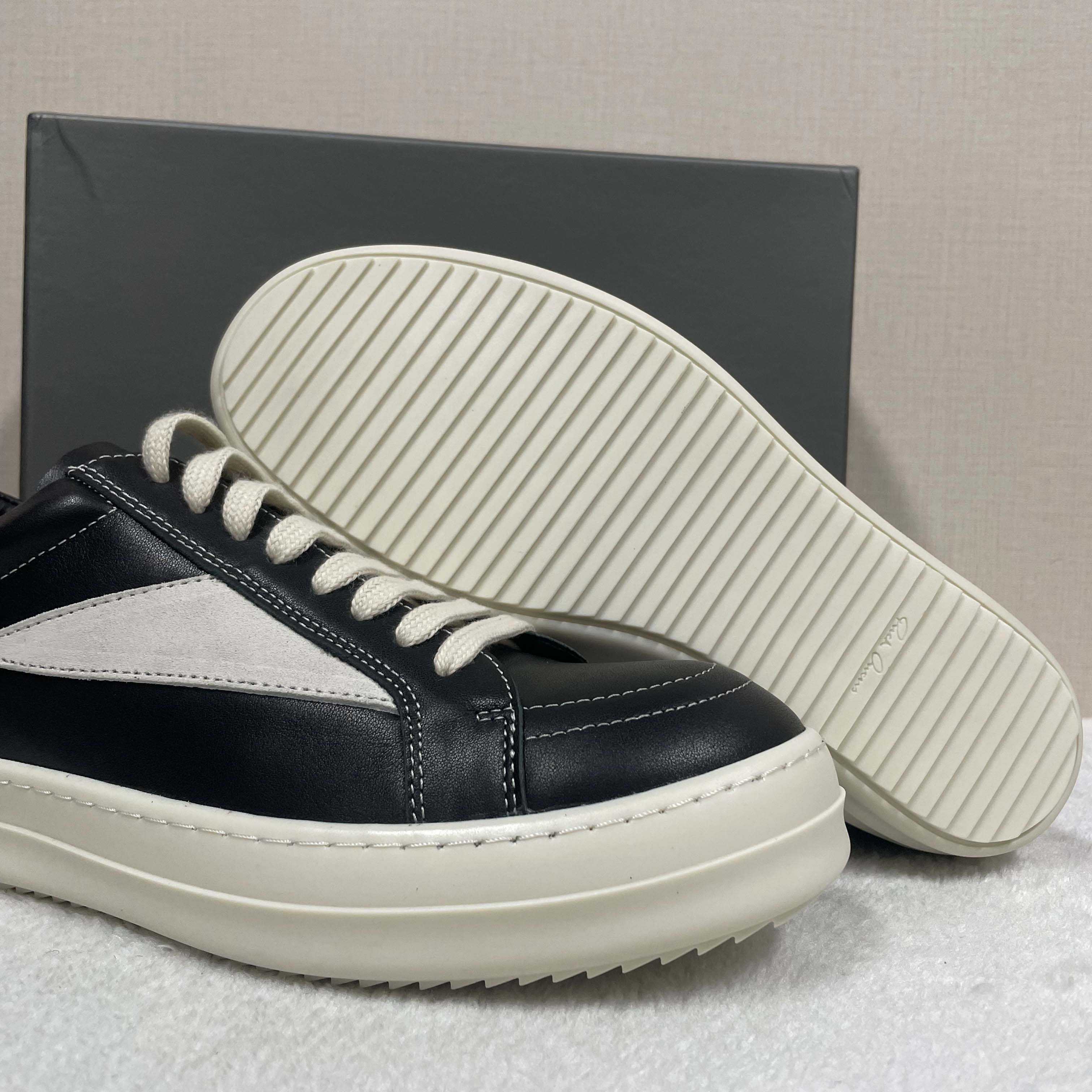 Rick Owens Low-Top Sneakers - FashionPlug