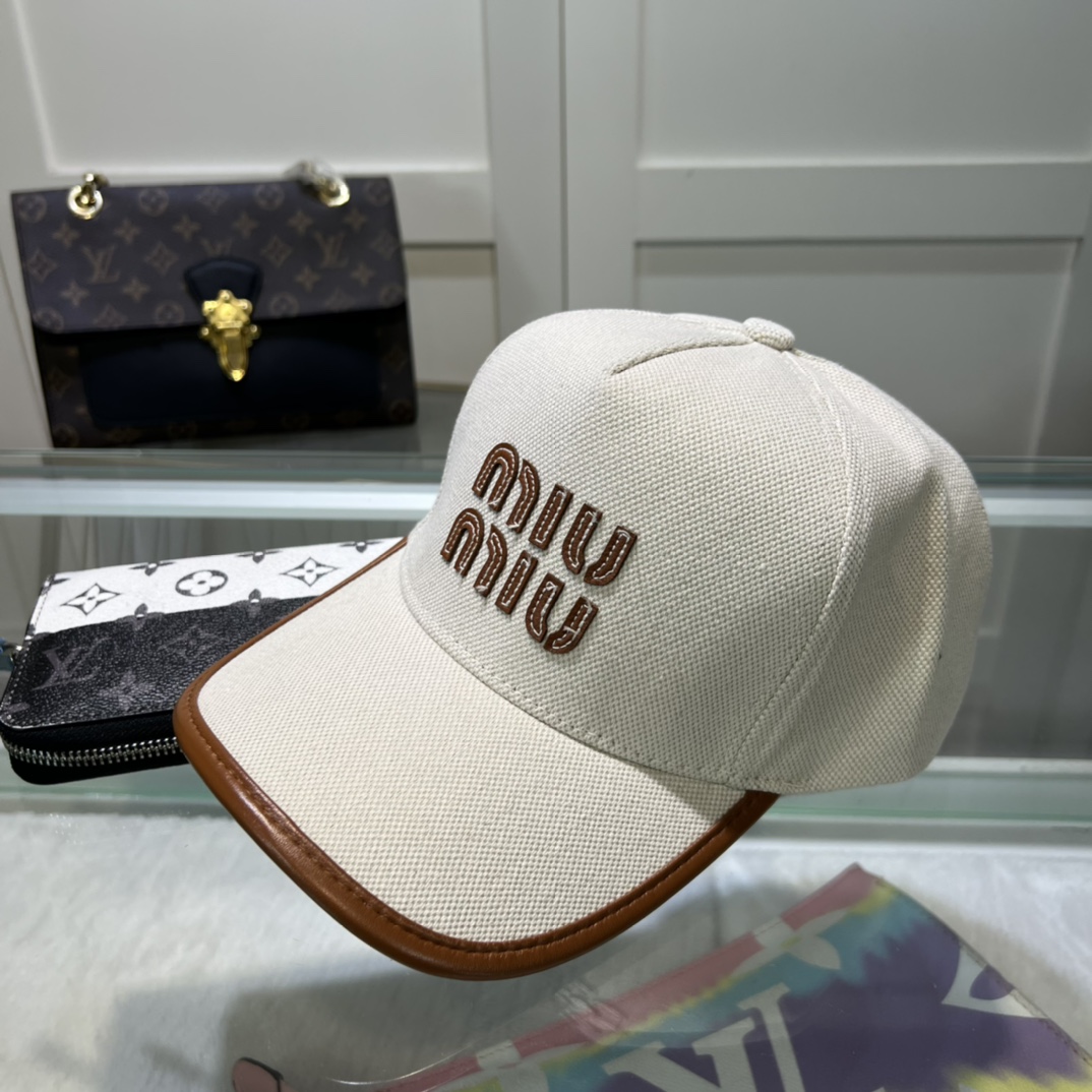 Miu Miu Baseball Cap - FashionPlug