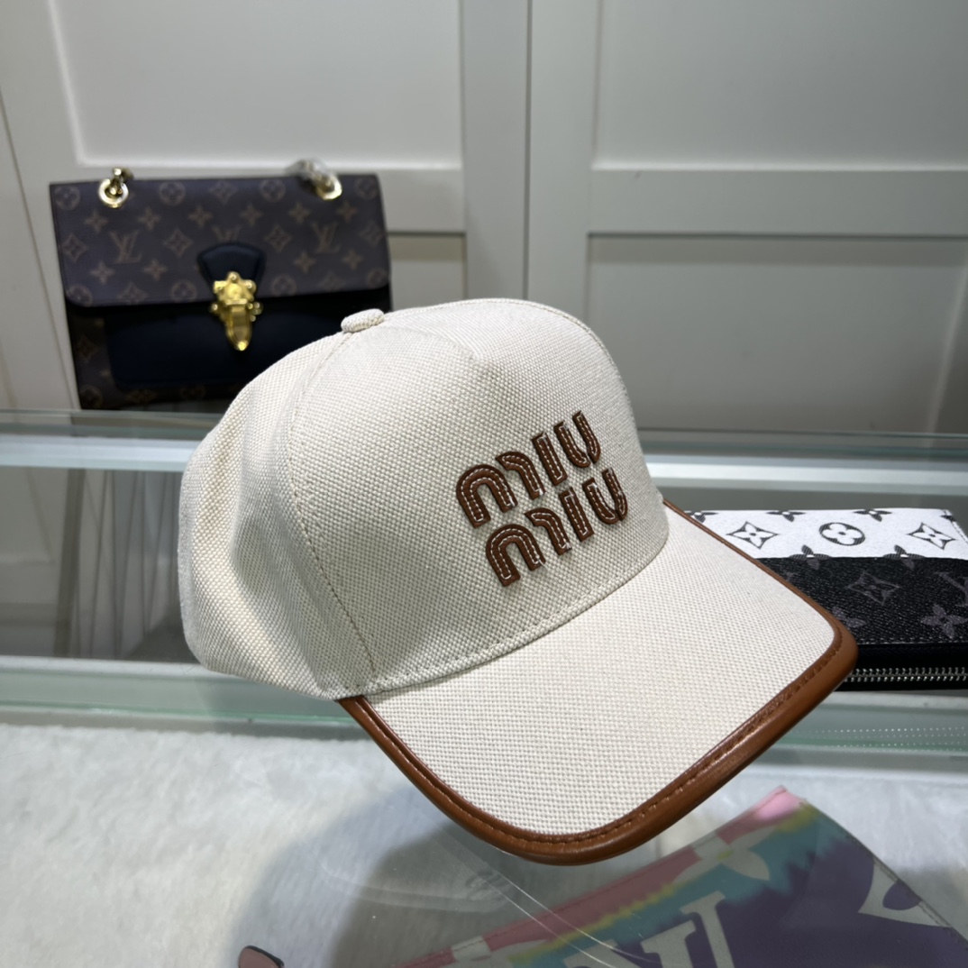 Miu Miu Baseball Cap - FashionPlug