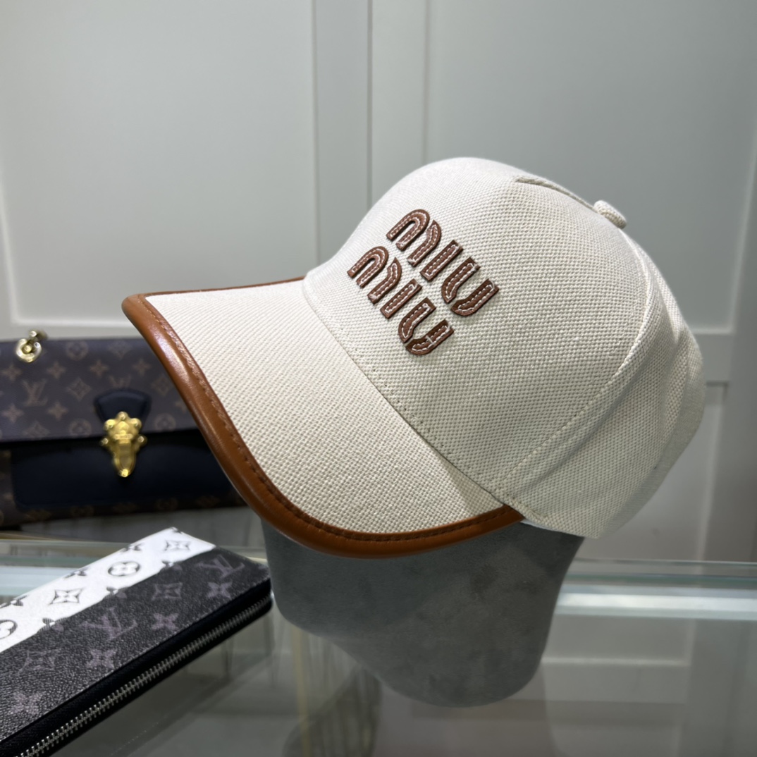 Miu Miu Baseball Cap - FashionPlug