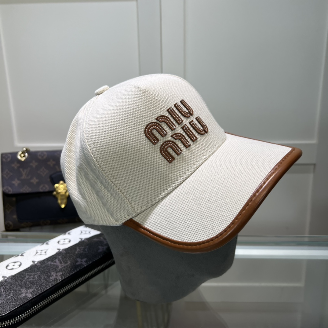 Miu Miu Baseball Cap - FashionPlug