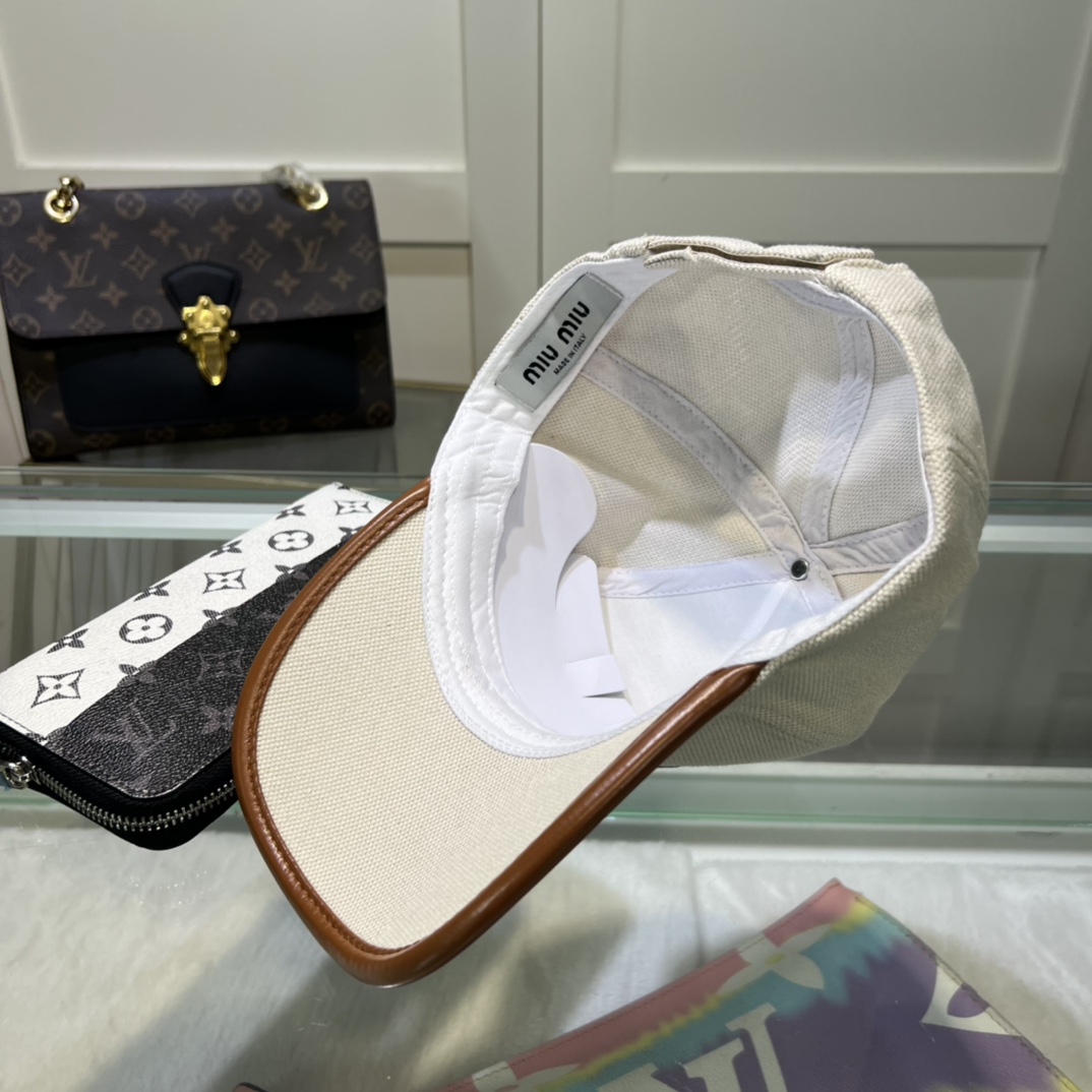 Miu Miu Baseball Cap - FashionPlug