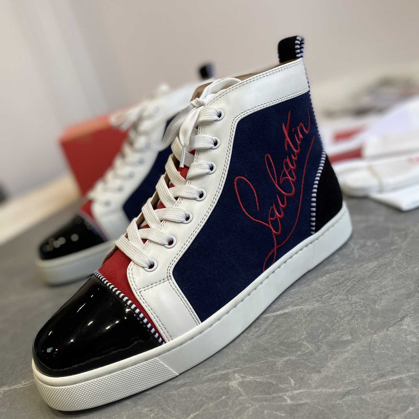 Christian Louboutin High-top Sneakers  - FashionPlug