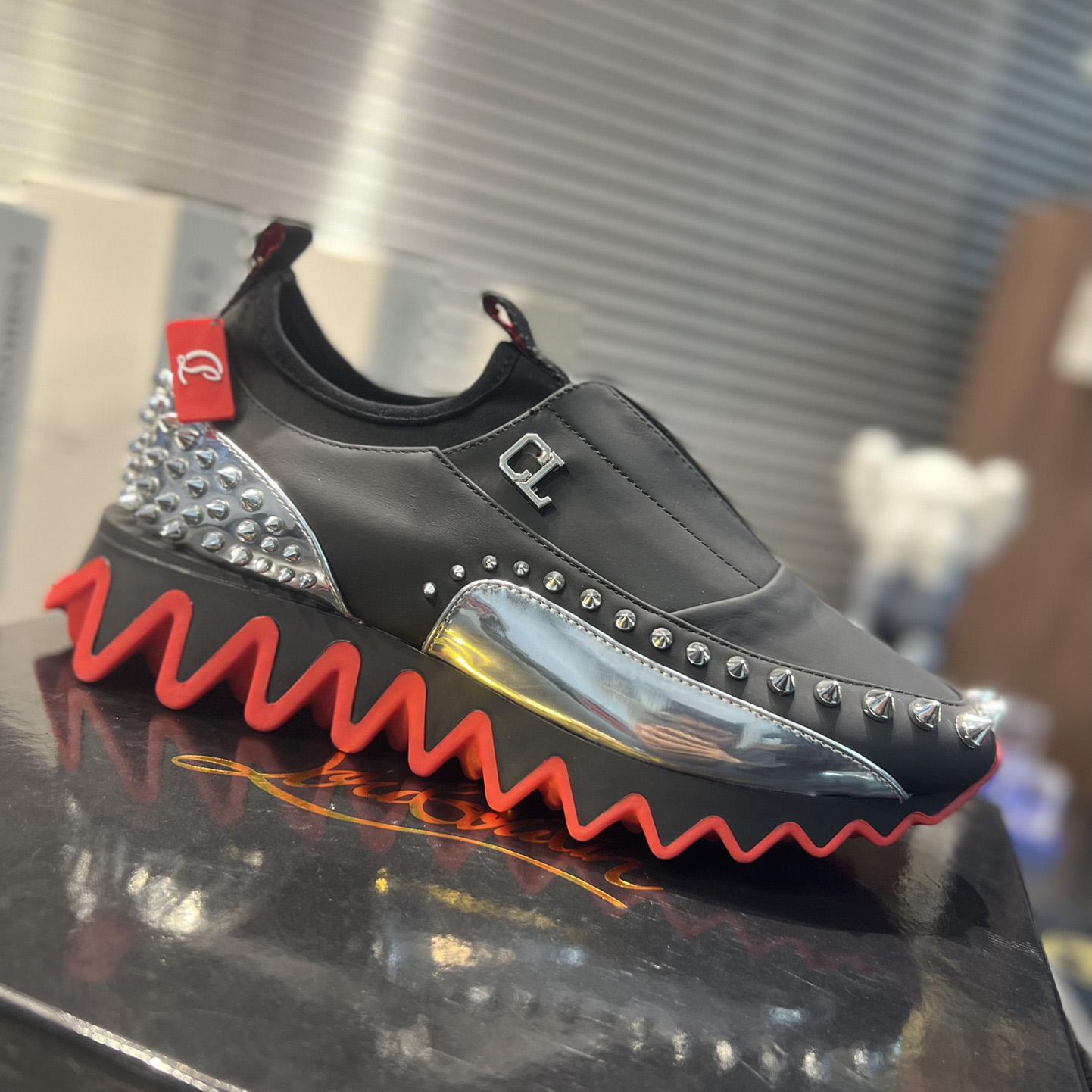 Christian Louboutin Khonshu Crescent  - FashionPlug