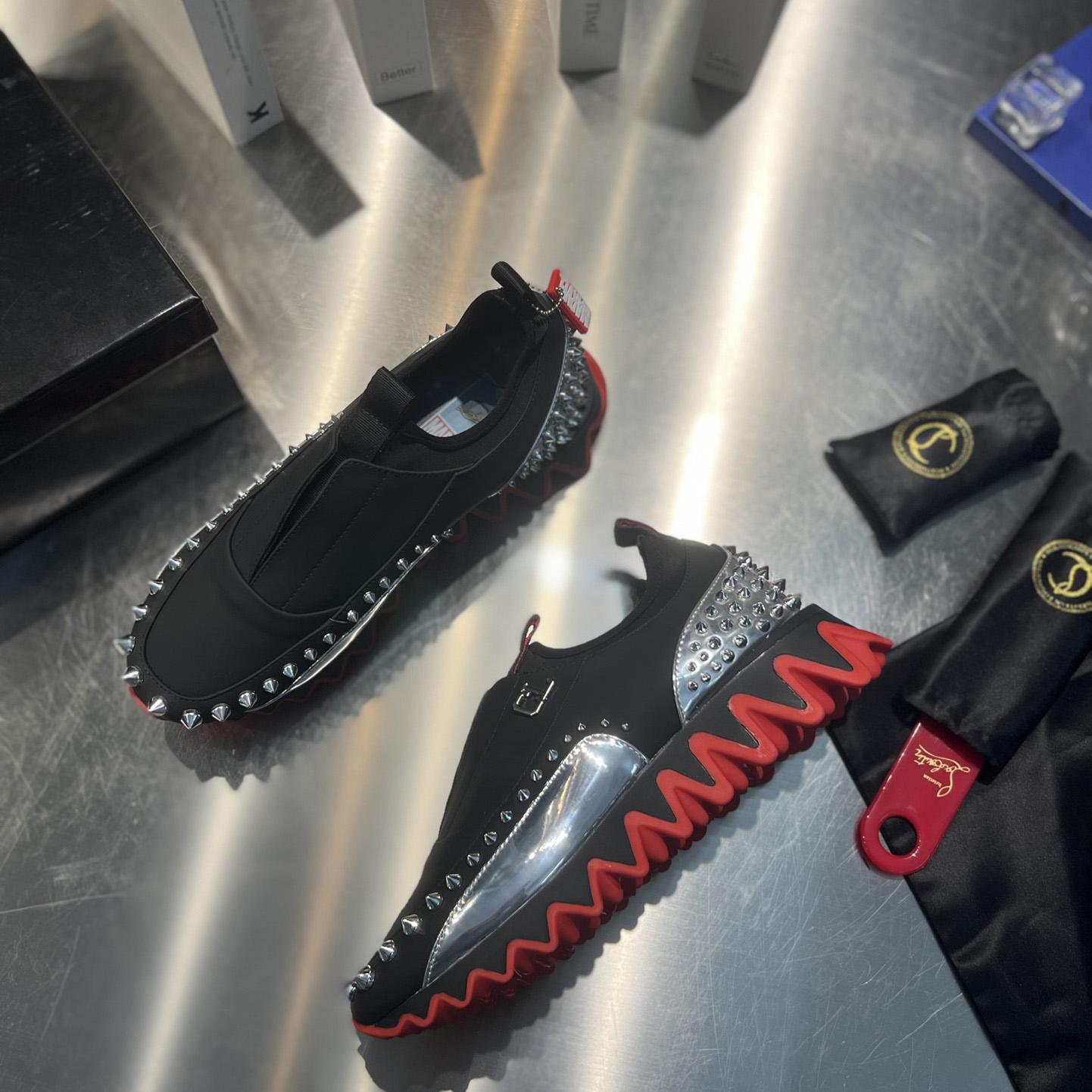 Christian Louboutin Khonshu Crescent  - FashionPlug
