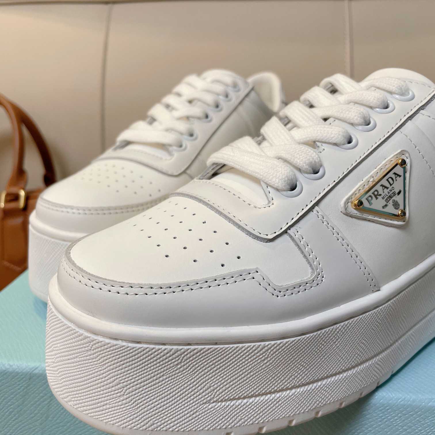 Prada Downtown Bold Leather Sneakers - FashionPlug