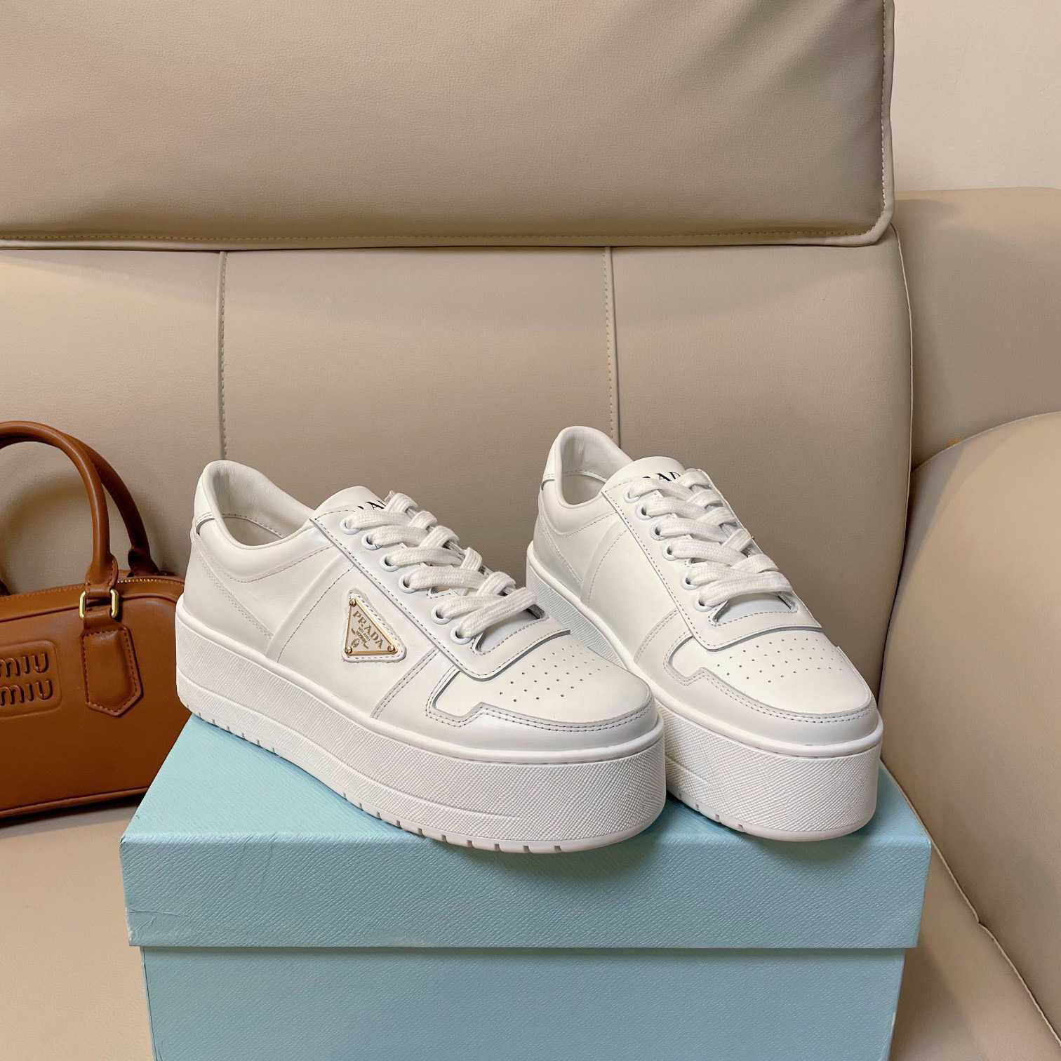Prada Downtown Bold Leather Sneakers - FashionPlug