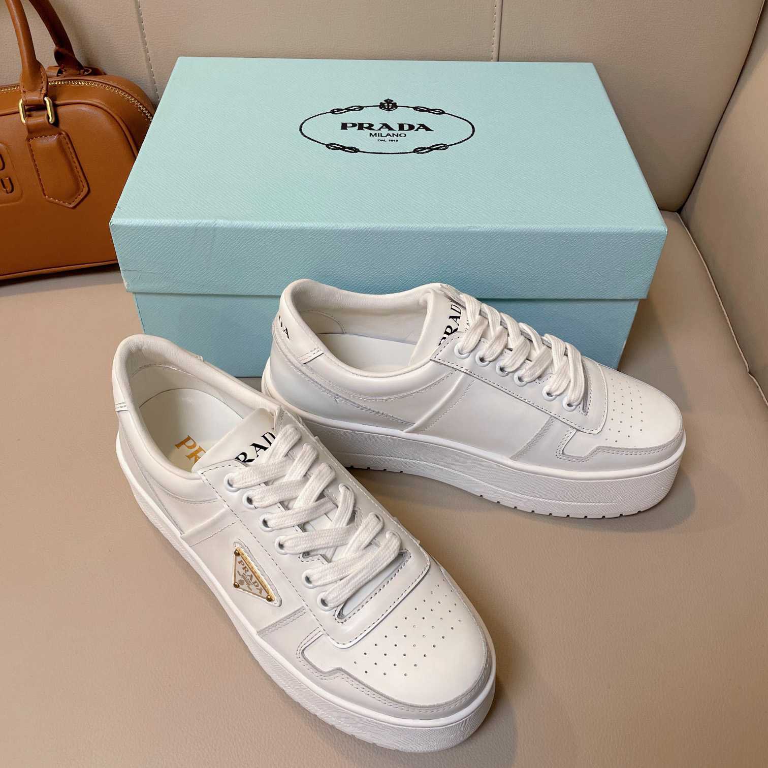 Prada Downtown Bold Leather Sneakers - FashionPlug