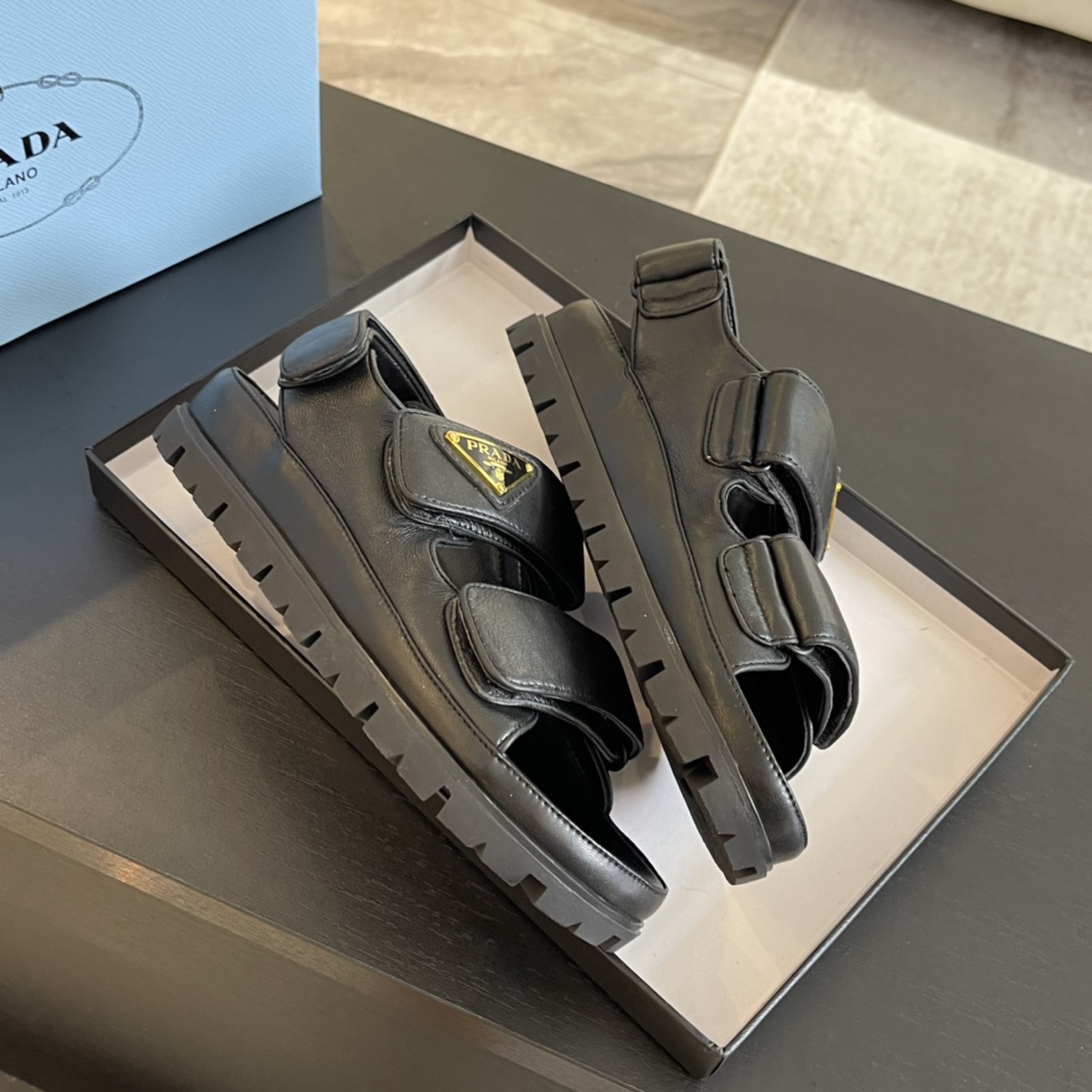 Prada Flat Nappa Leather Sandals - FashionPlug