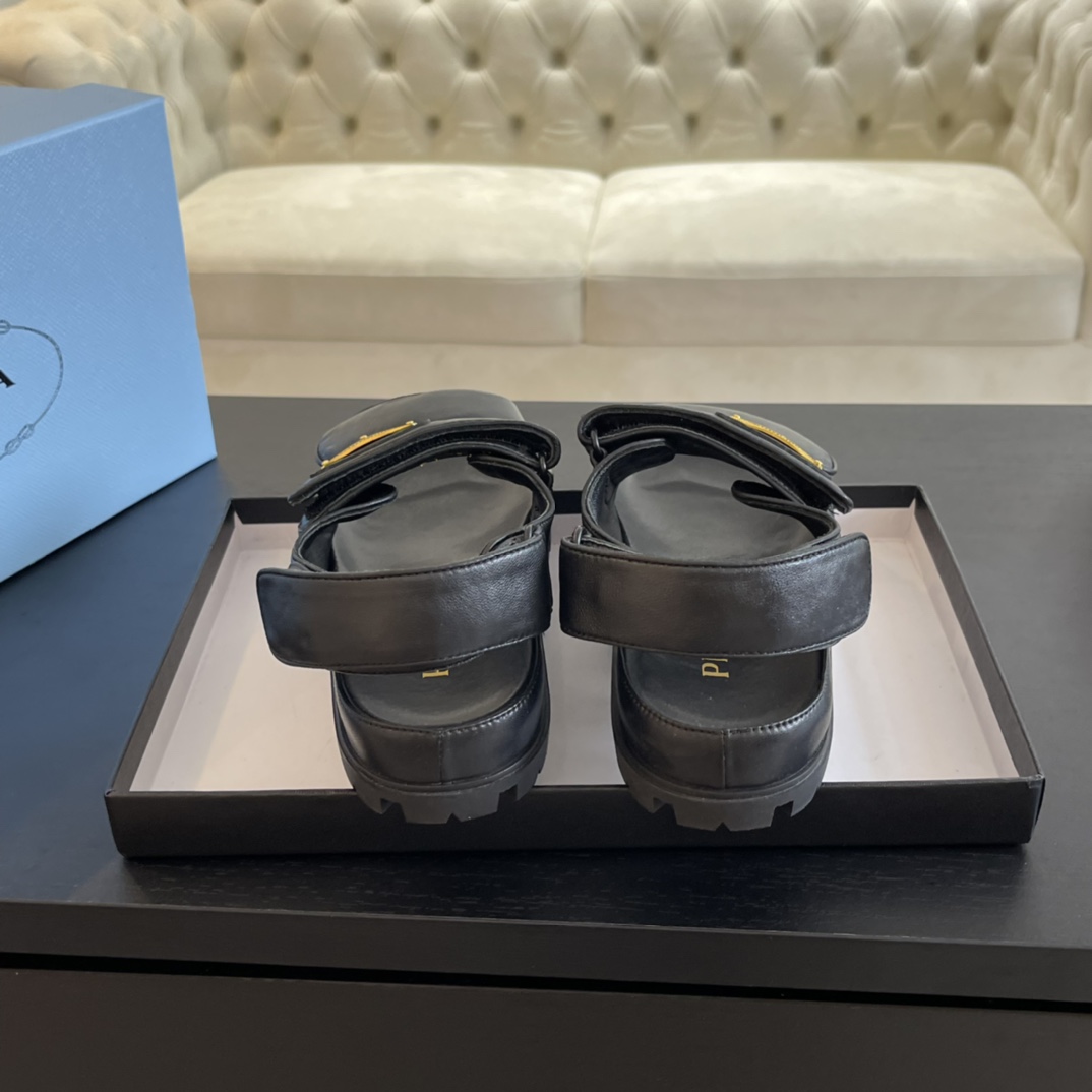 Prada Flat Nappa Leather Sandals - FashionPlug