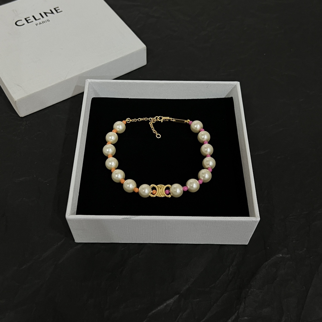 Celine Plage Pearl Bracelet In Brass With Gold Finish And Resin - FashionPlug