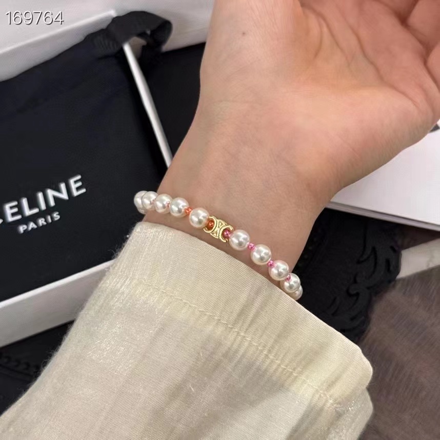 Celine Plage Pearl Bracelet In Brass With Gold Finish And Resin - FashionPlug
