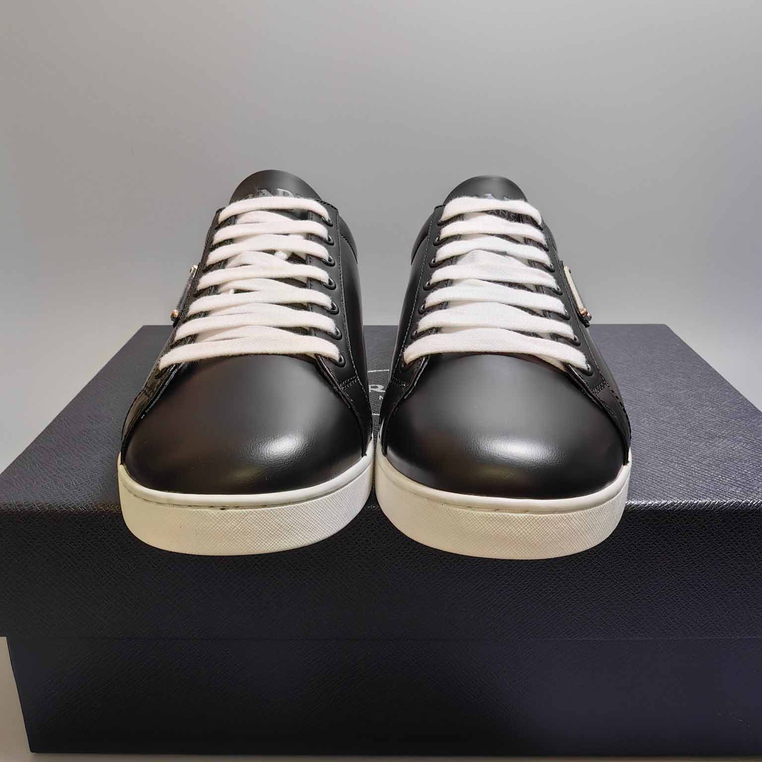 Prada Brushed Sneakers - FashionPlug