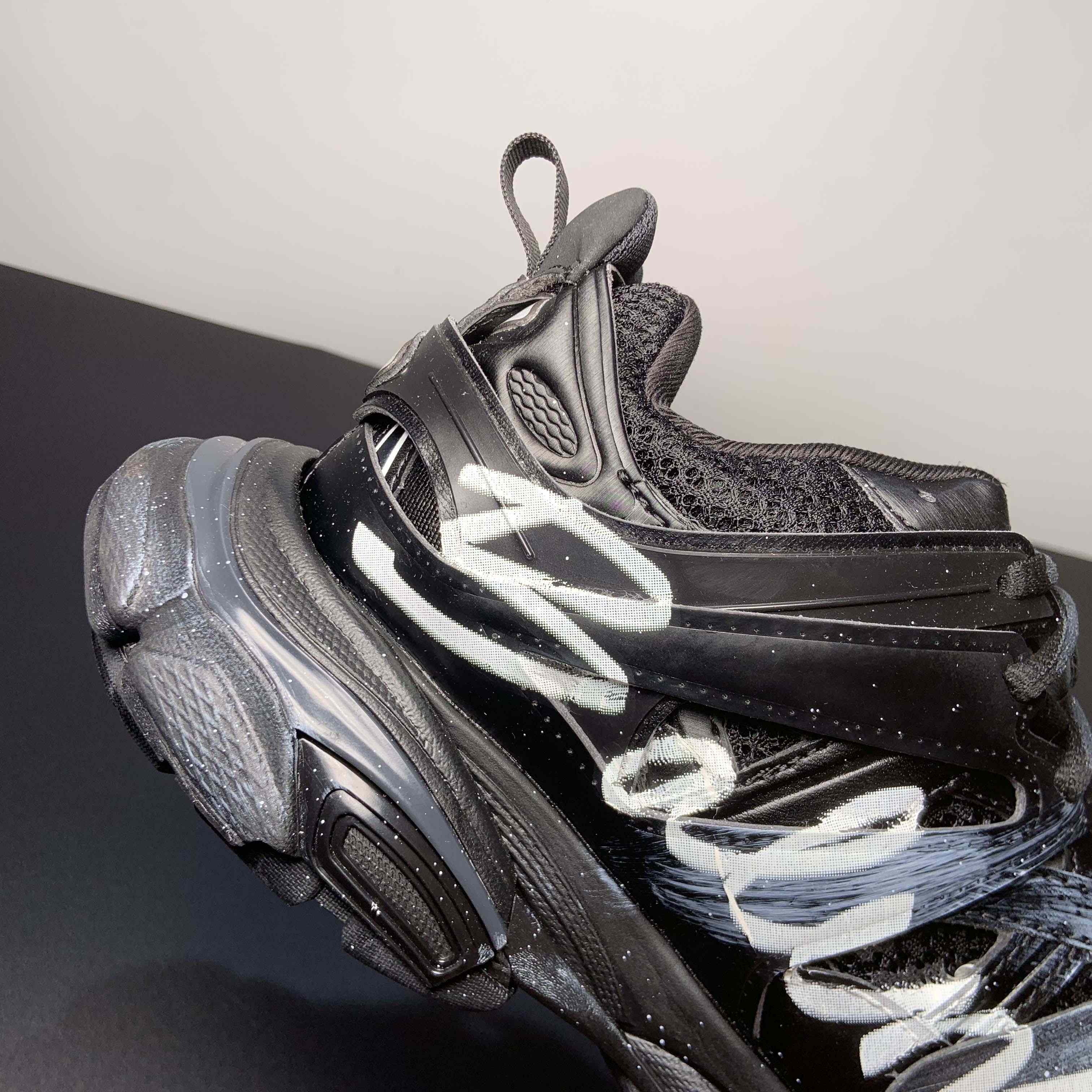 Balenciaga Track Signature Sneaker in black - FashionPlug