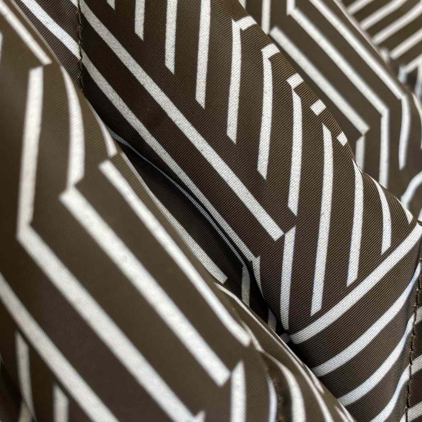 Fendi Shadow-print Panelled Down Jacket - FashionPlug