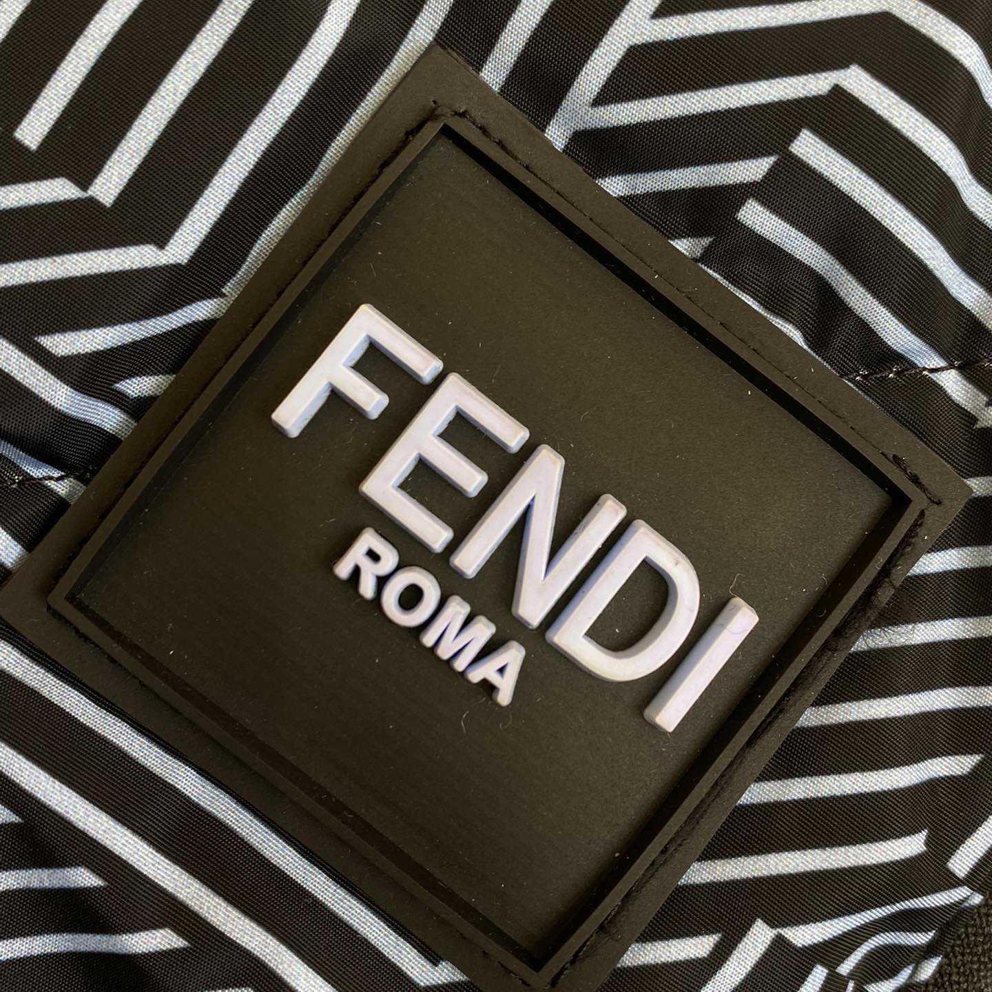Fendi Shadow-print Panelled Down Jacket - FashionPlug