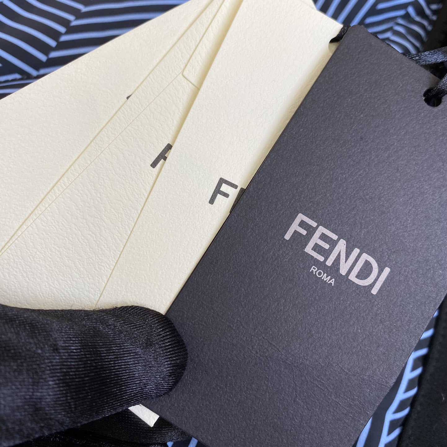Fendi Shadow-print Panelled Down Jacket - FashionPlug