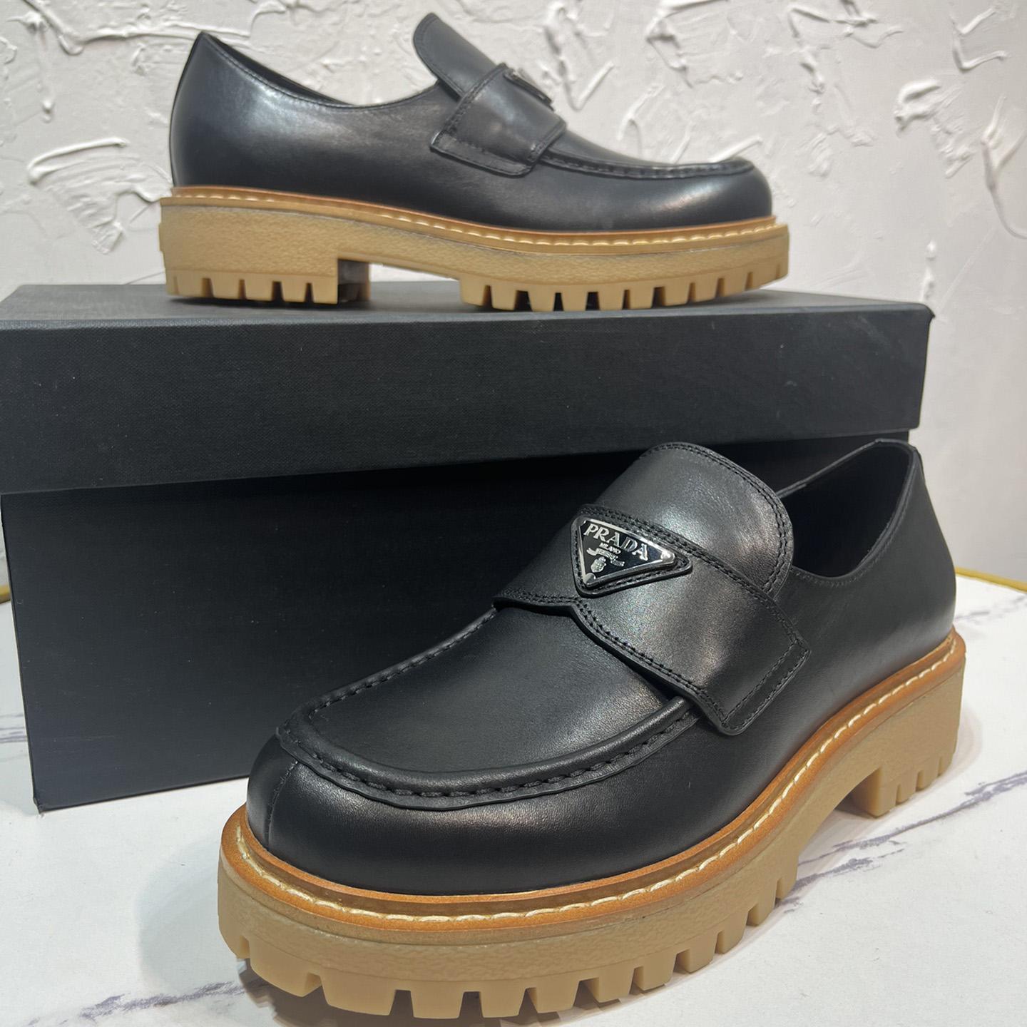 Prada Leather Loafers In Black - FashionPlug