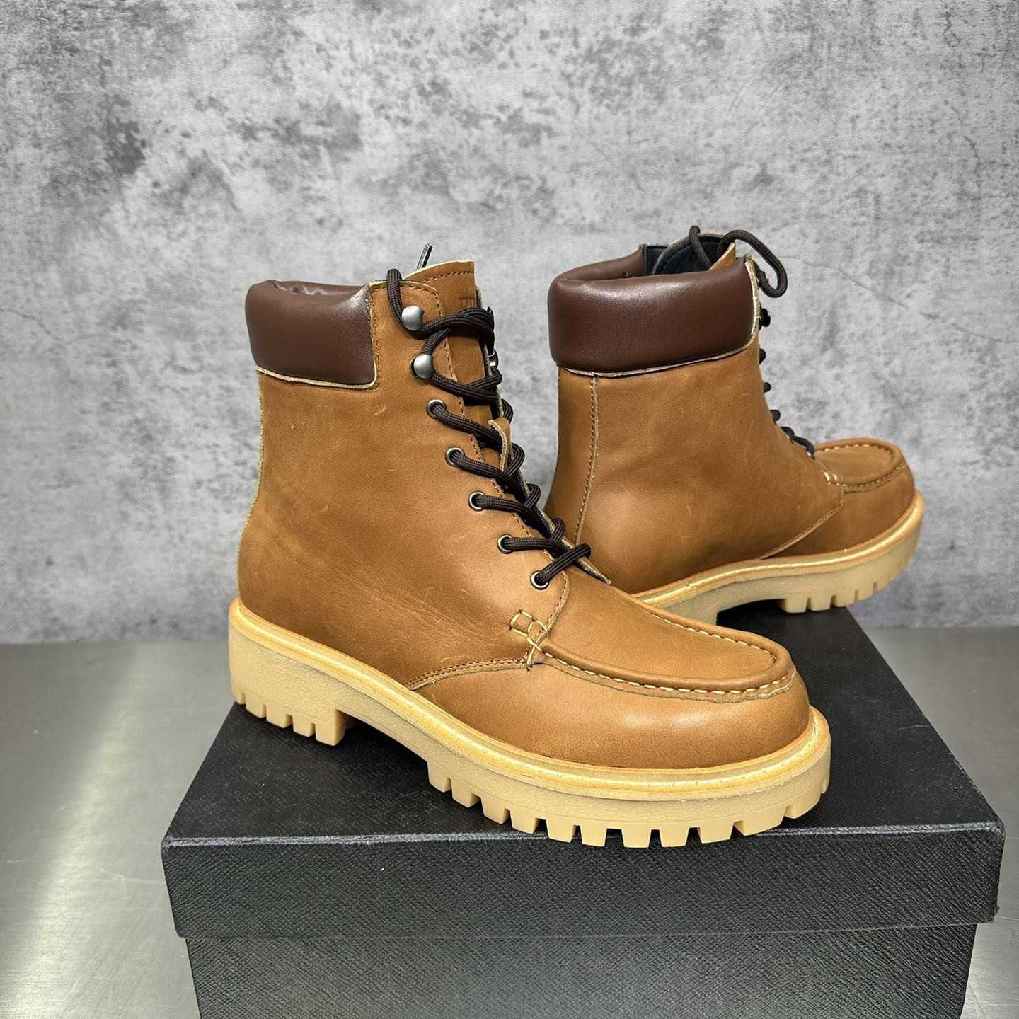Prada Lug-sole Leather Boots - FashionPlug