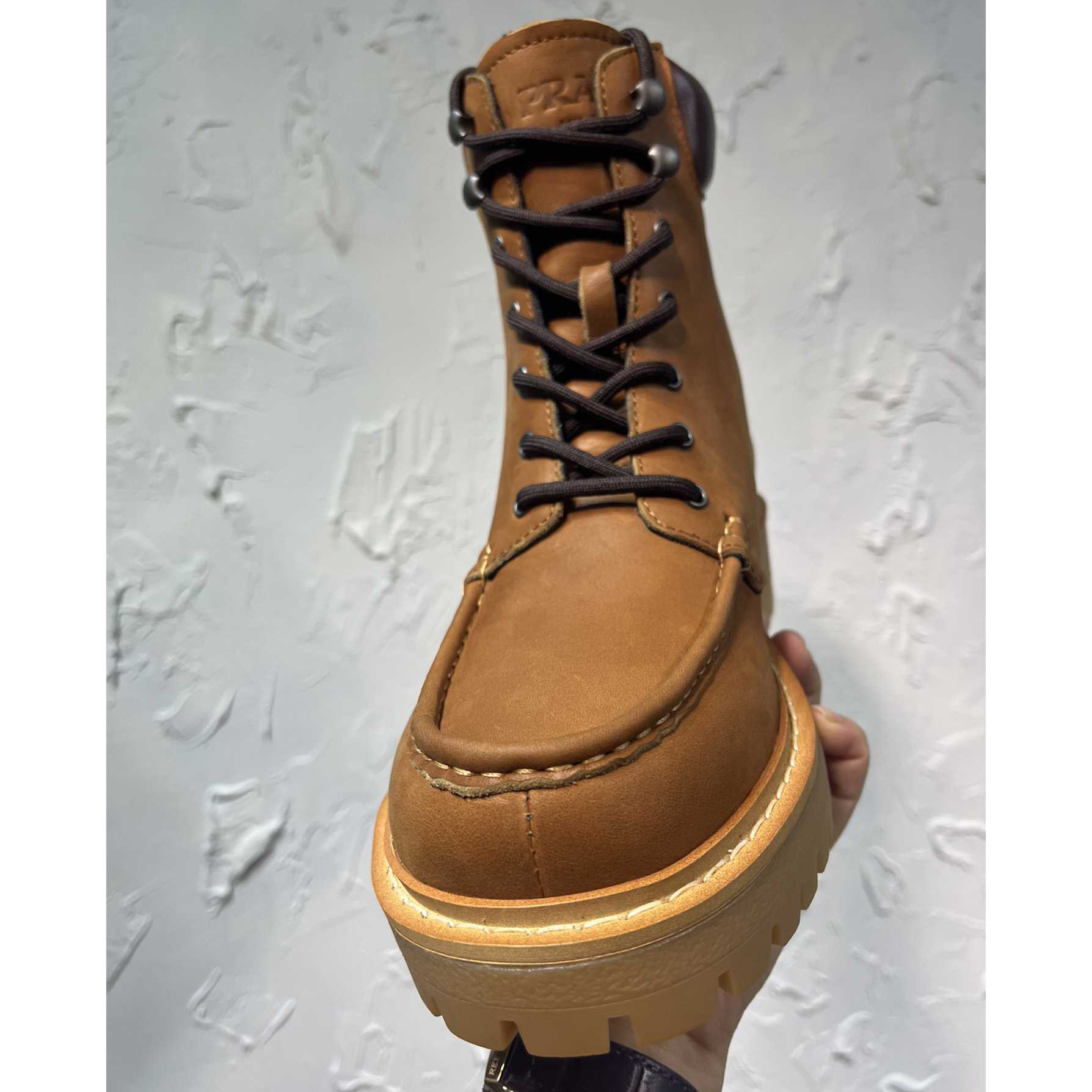 Prada Lug-sole Leather Boots - FashionPlug